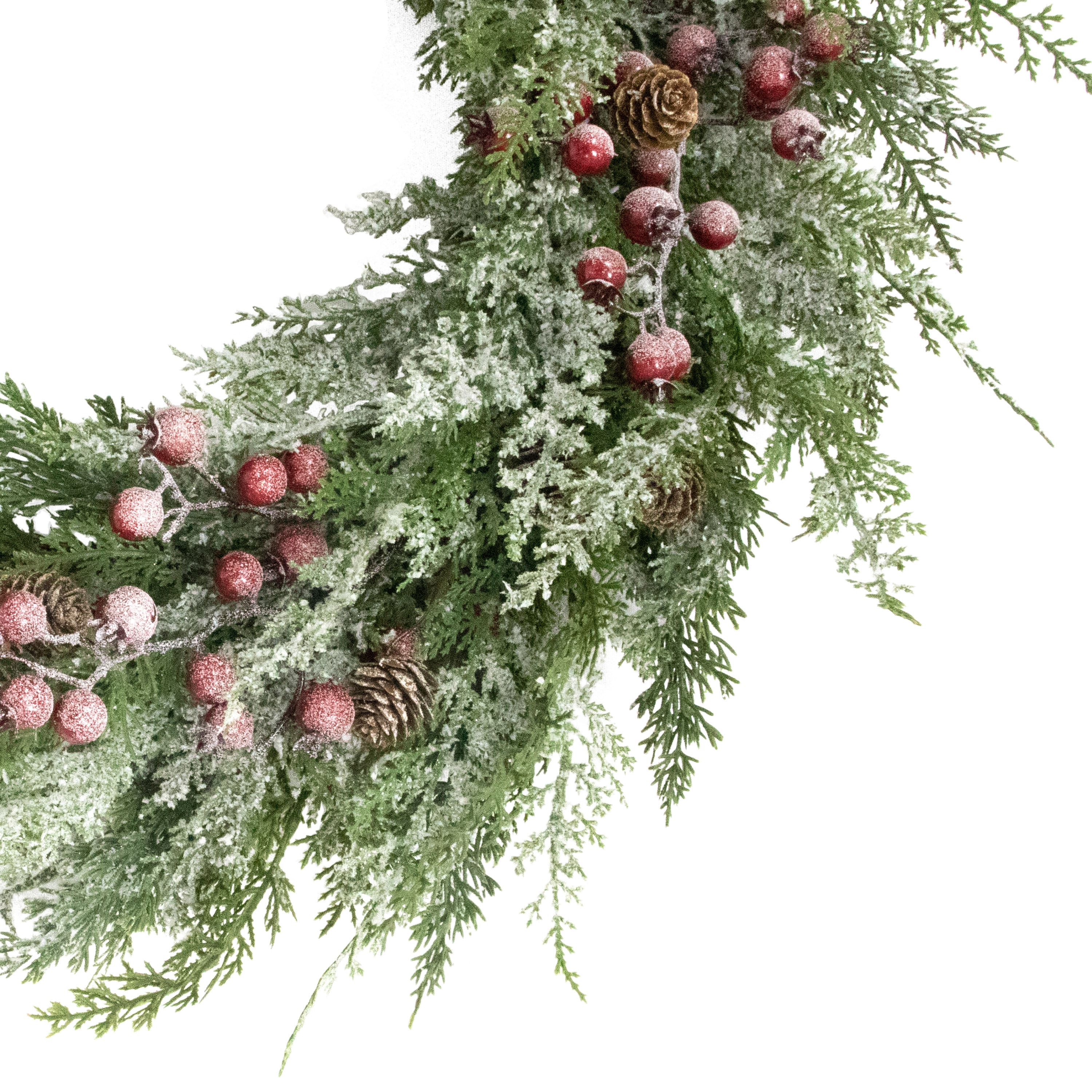 24" Flocked Green Adorned Artificial Wreath with Pinecones & Red Berries