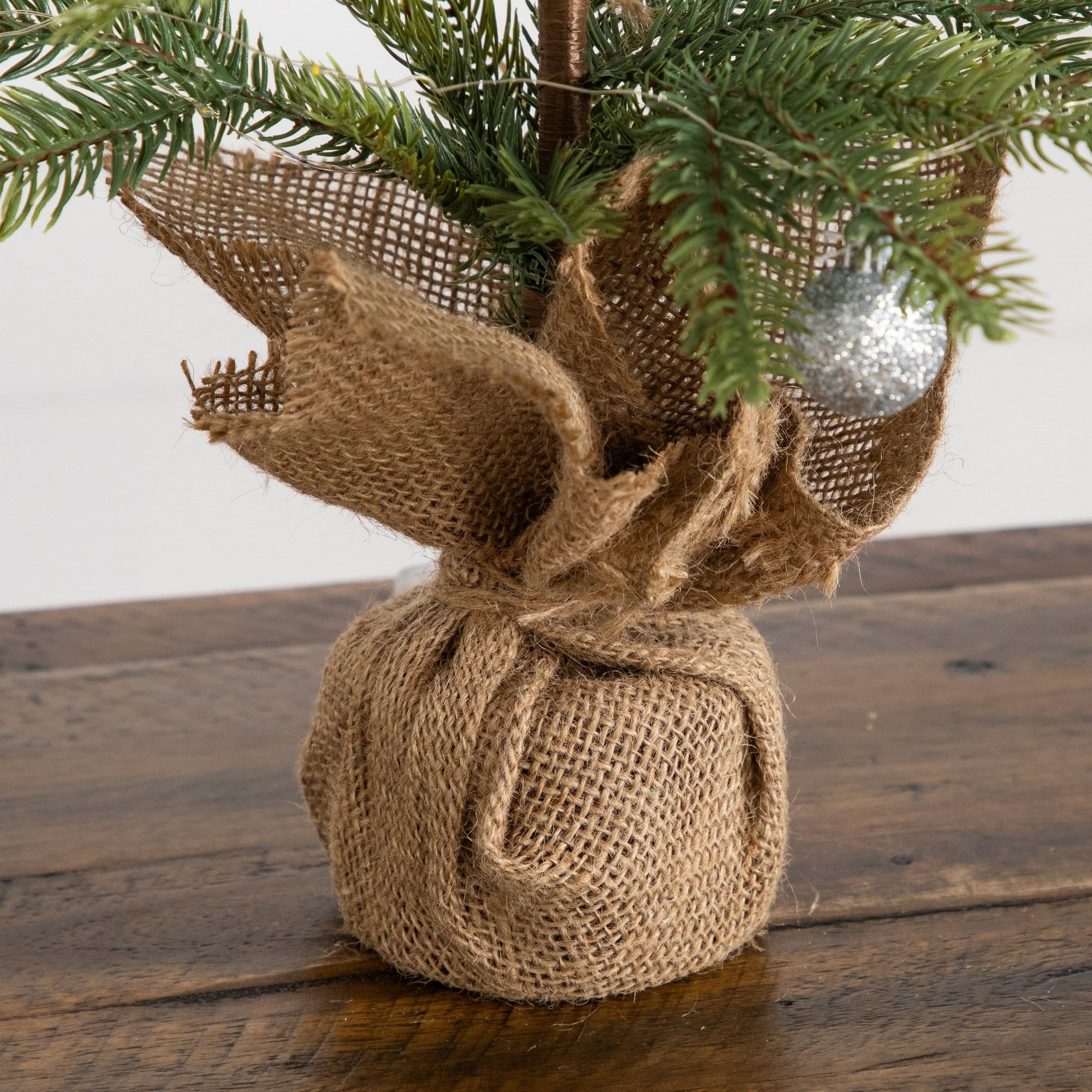 Nearly Natural 24" Pre-Lit Natural Look Fraser Fir Artificial Christmas Tree in Burlap Wrapped Base