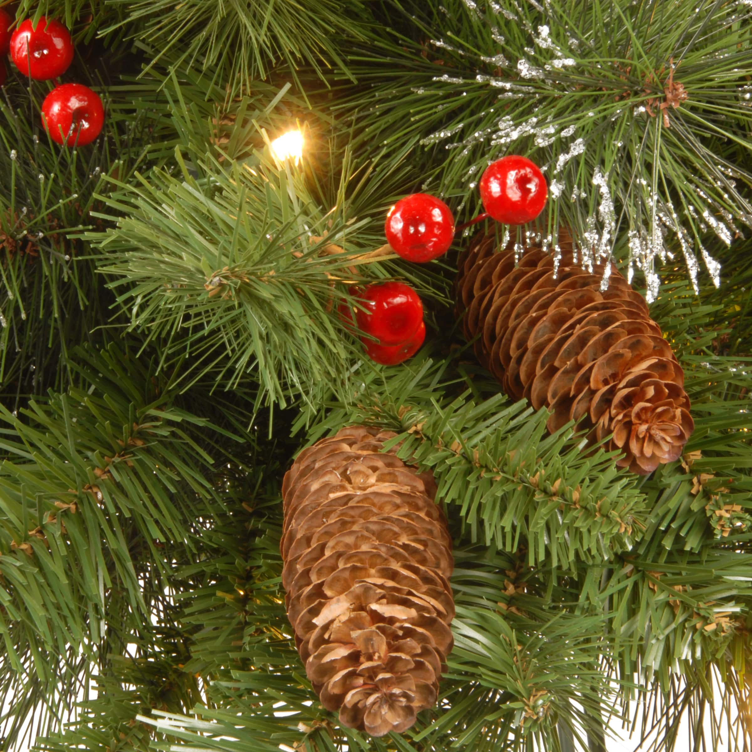 24" Crestwood® Spruce Wreath with Silver Bristle, Pine Cones, Red Berries & Glitter with Warm White LED Lights