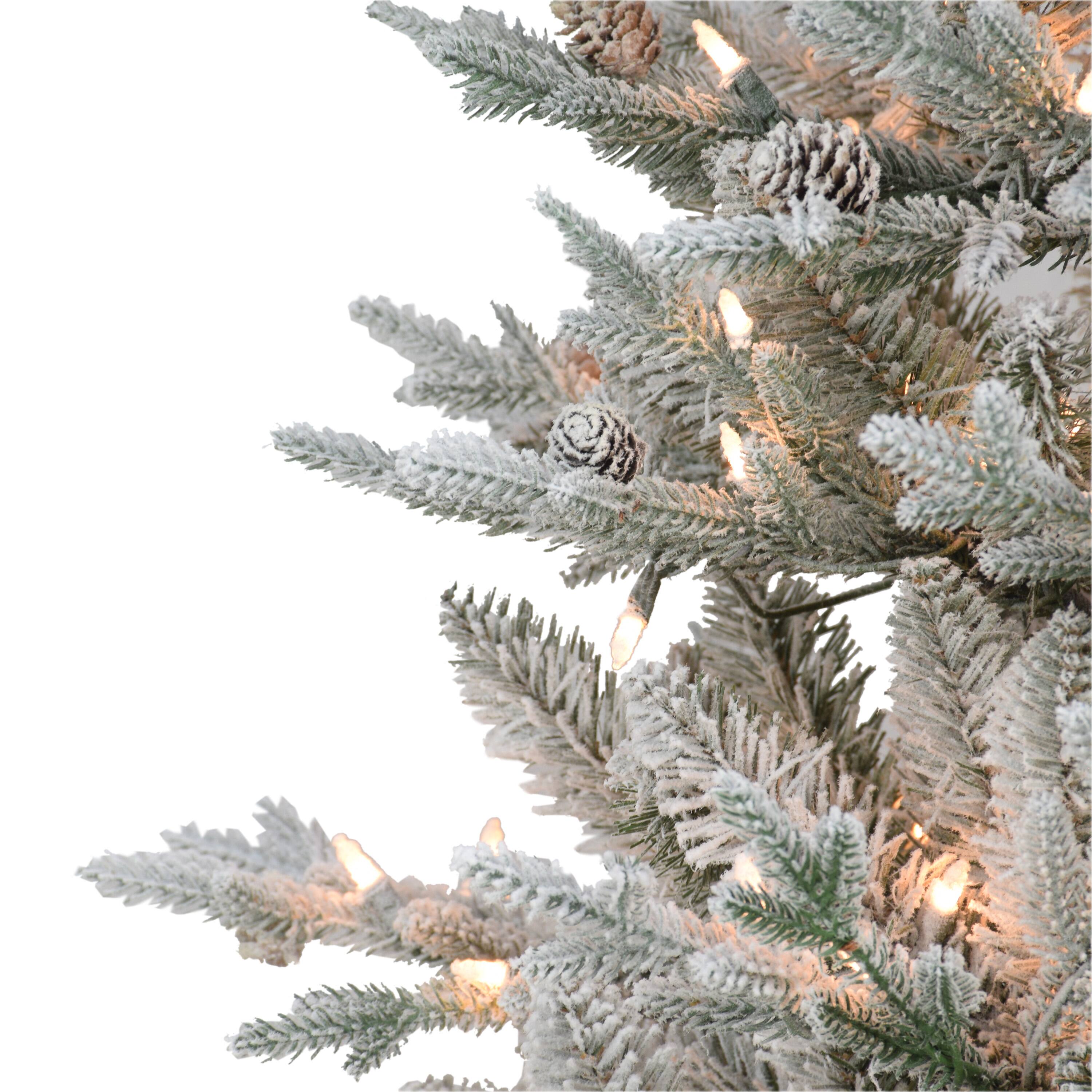 4.5ft. Pre-Lit Flocked Artificial Christmas Tree in Metal Planter, Clear Lights