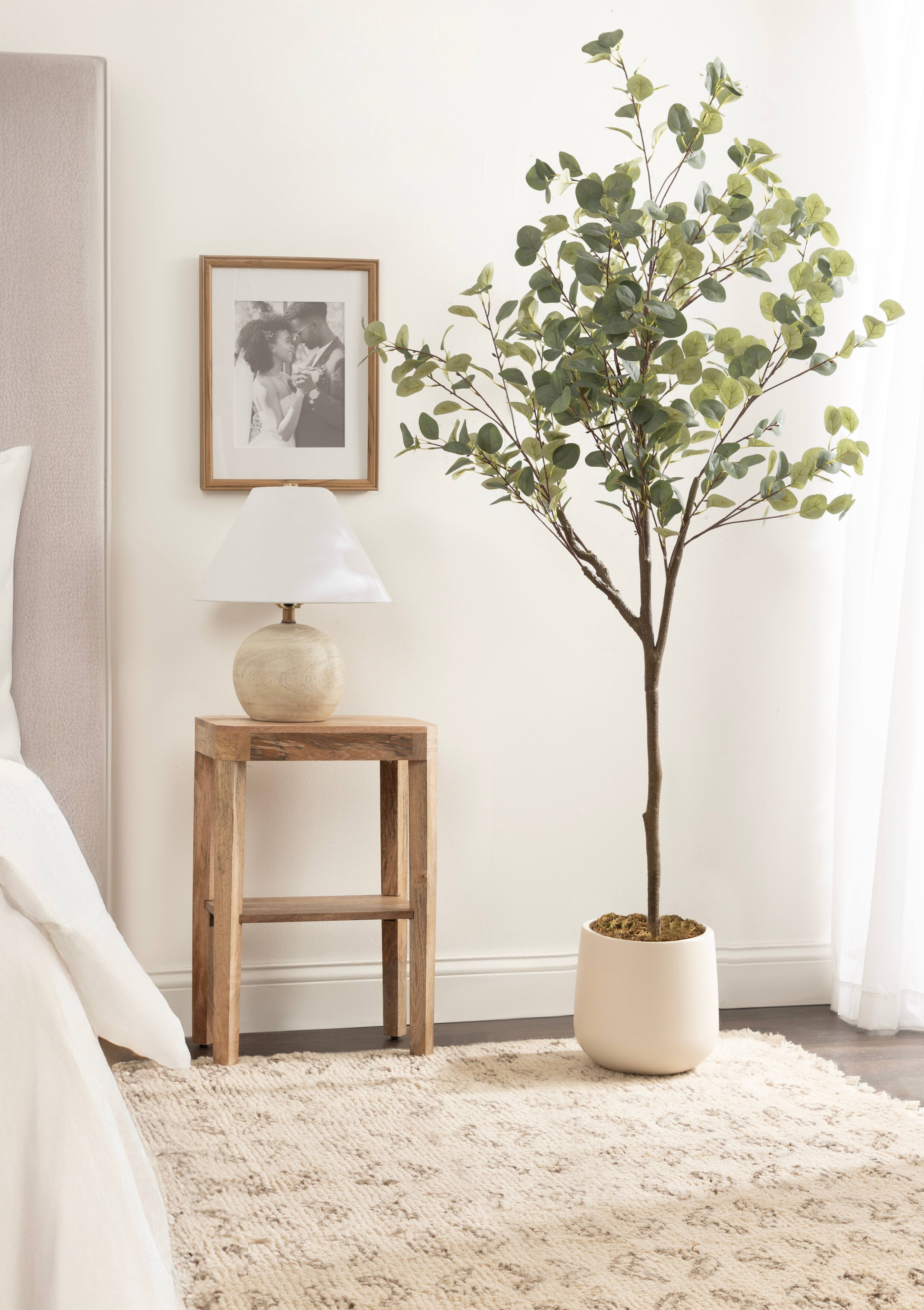 Kate and Laurel 6ft. Eudora Faux Eucalyptus Tree with Cream Planter