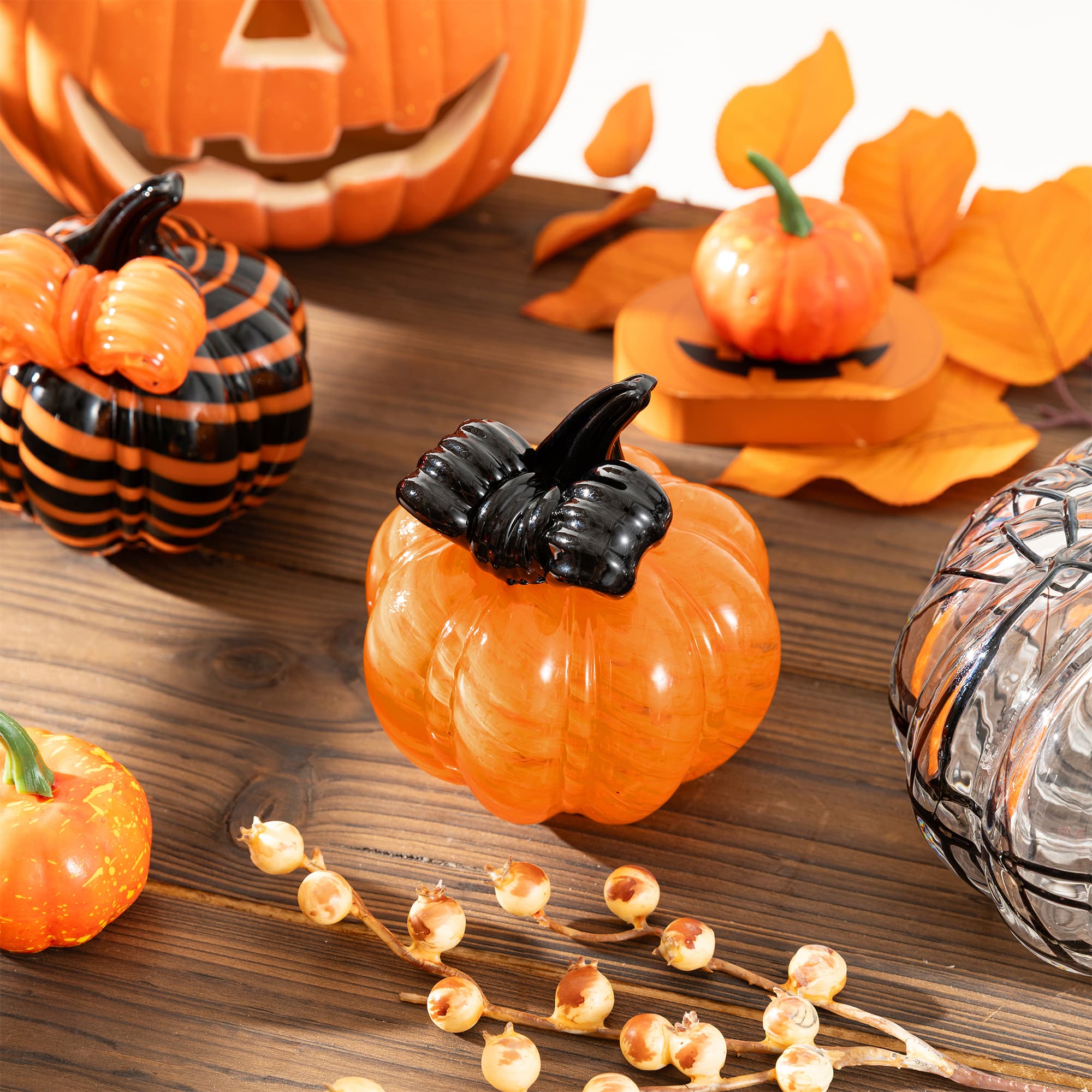 Glitzhome® 4.75" Halloween Striped Glass Pumpkin with Bow