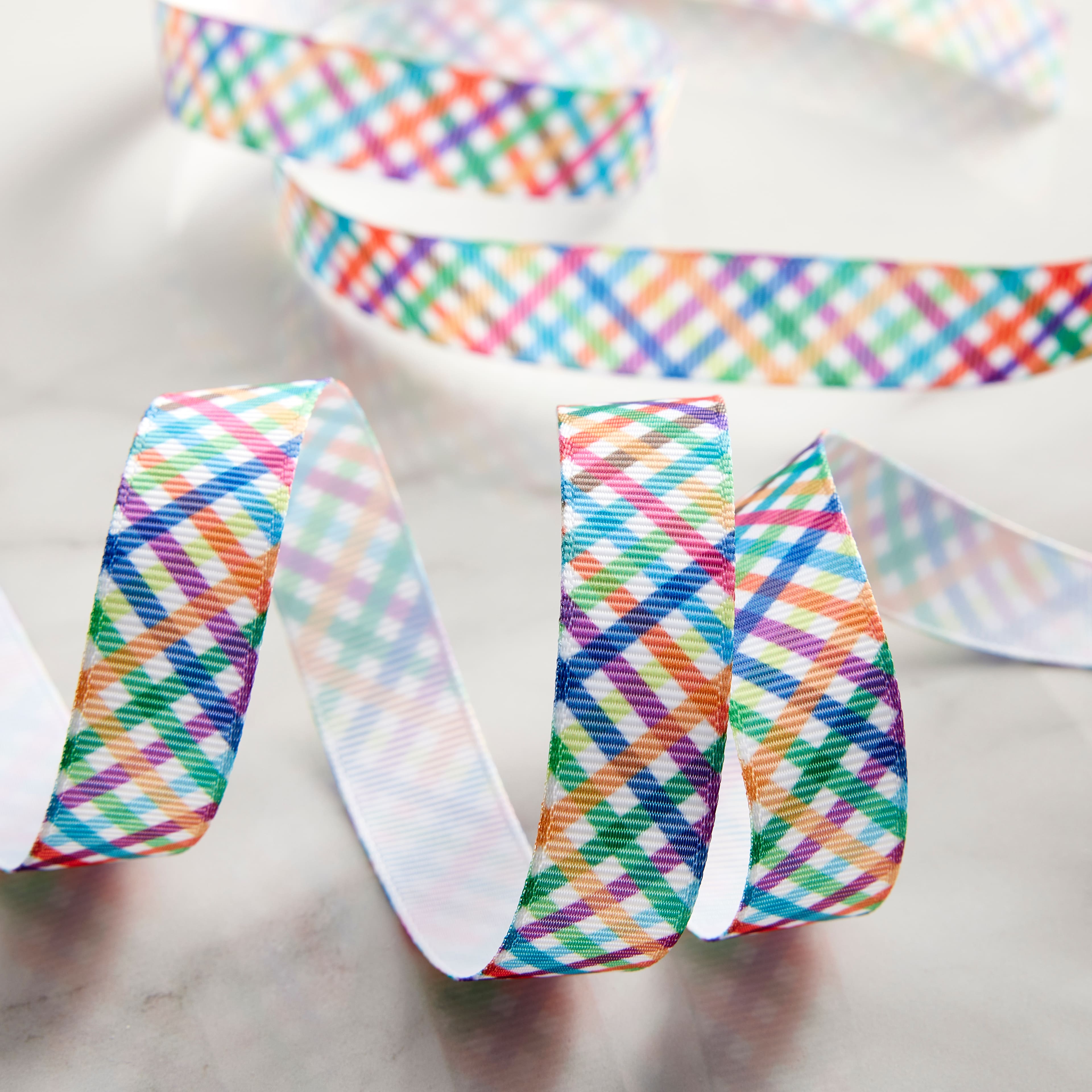 12 Pack: 5/8'' x 7yd. Rainbow Plaid Ribbon by Celebrate It®