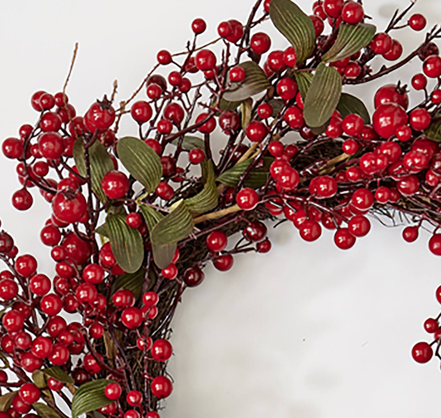 Worth Imports 22" Red Holly Berry and Green Leaves  Artificial Christmas Wreath on Natural Twig Base