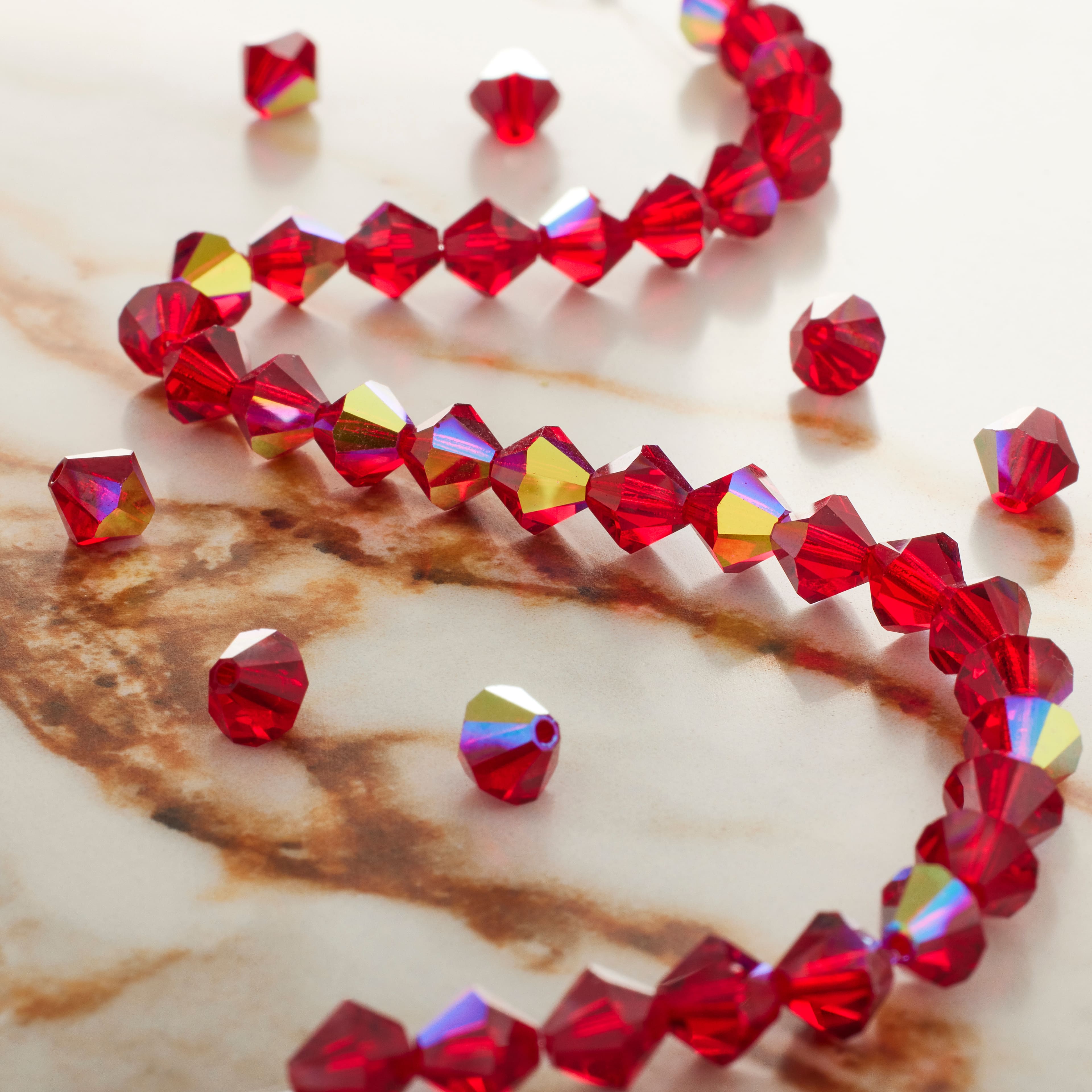 12 Pack: Preciosa Glass Crystal Bicone Beads, 6mm by Bead Landing™