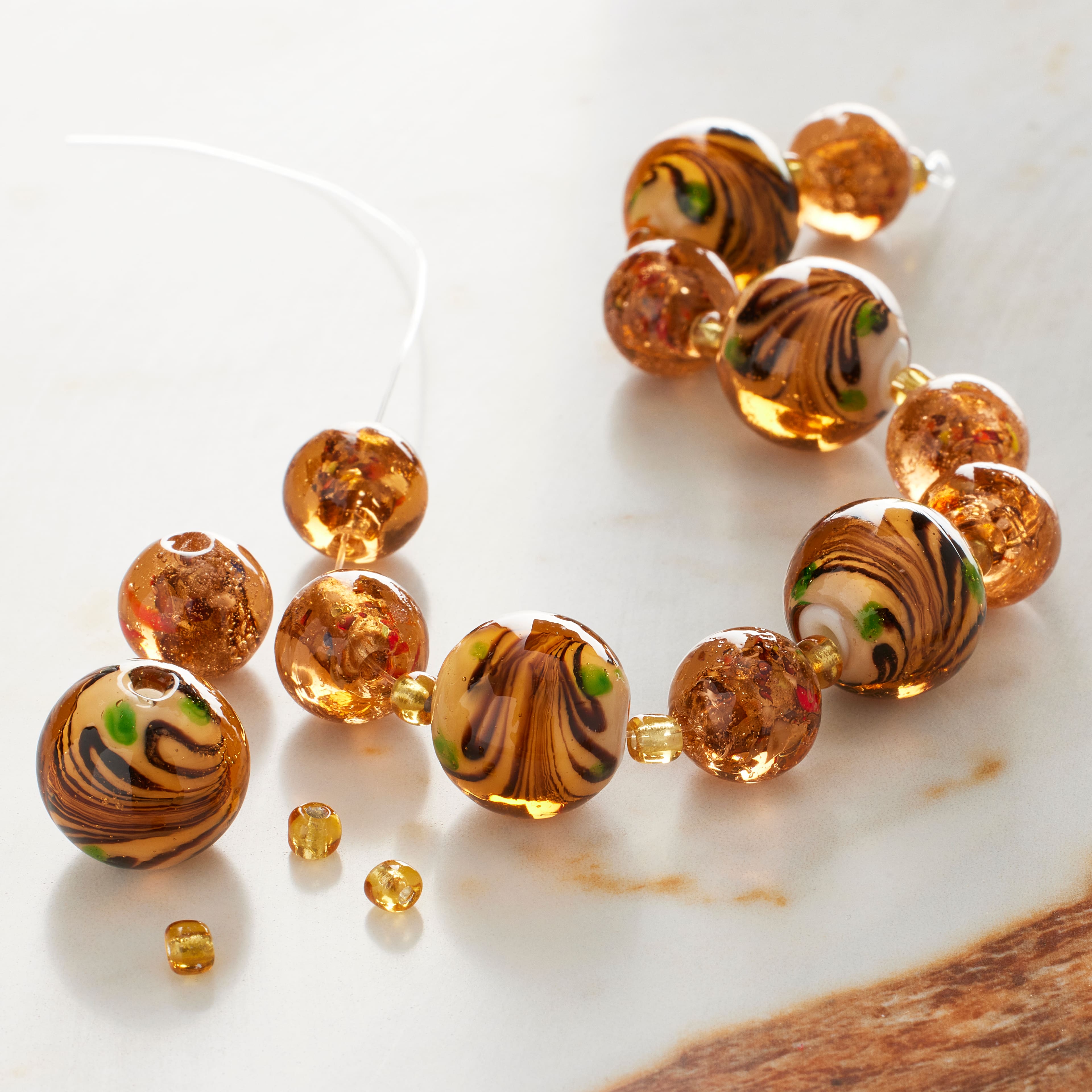 12 Pack: Amber Lampwork Glass Beads by Bead Landing™