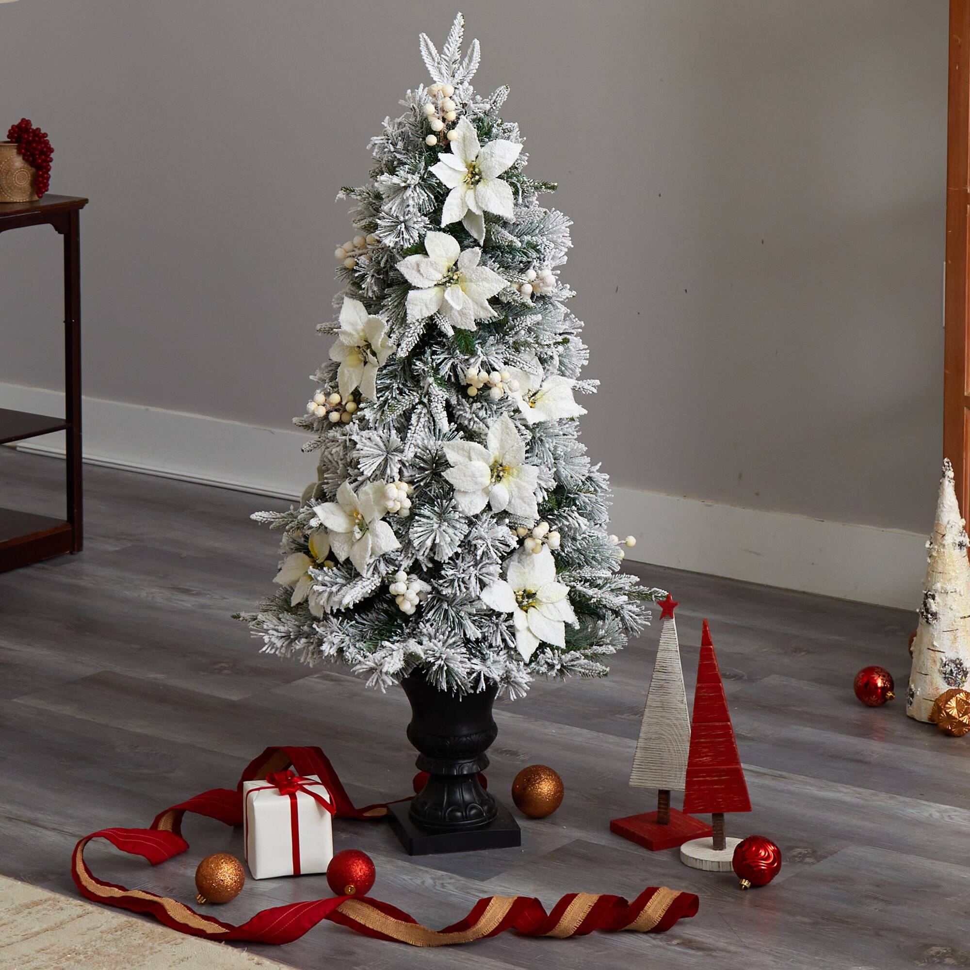 4ft. Pre-Lit Flocked Artificial Christmas Tree in Decorative Urn, Warm White Lights