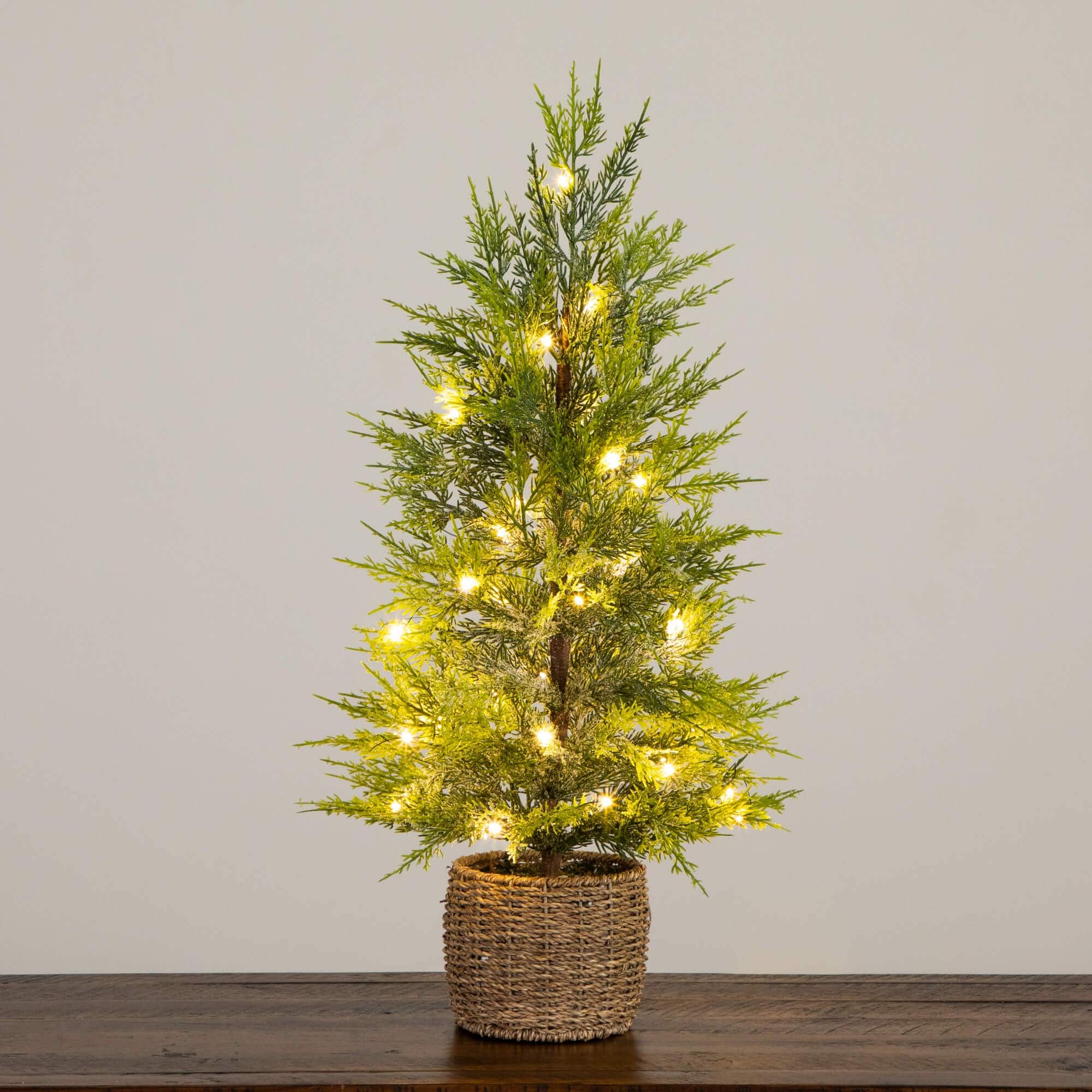 32in. Pre-Lit Artificial Lightly Snowed Cypress Christmas Tree with 30 Warm White LED Lights in Decorative Weaved Basket