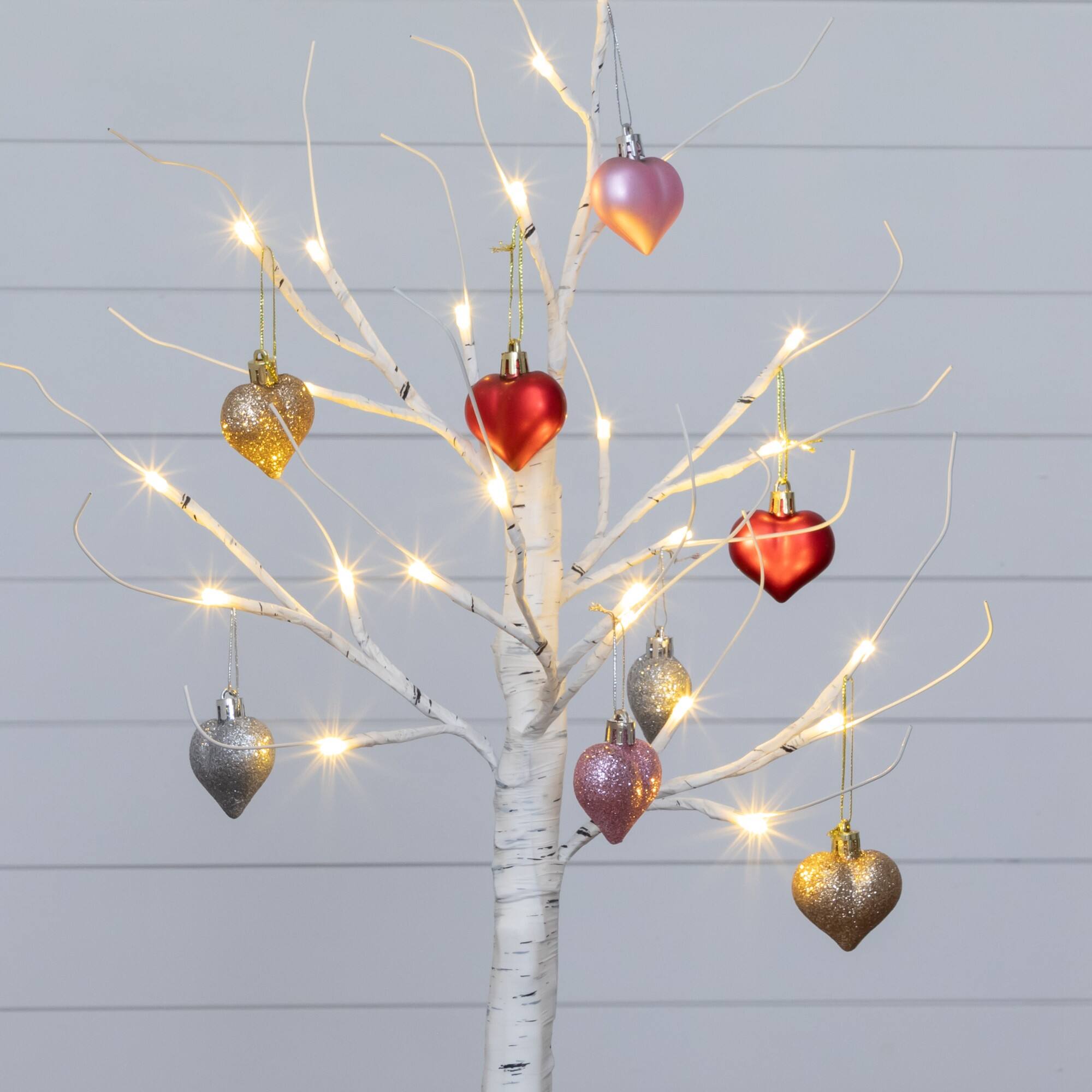 2ft. Pre-Lit Artificial Valentine's Day Twig Tree with 24 Warm White LED Lights and Heart Ornaments