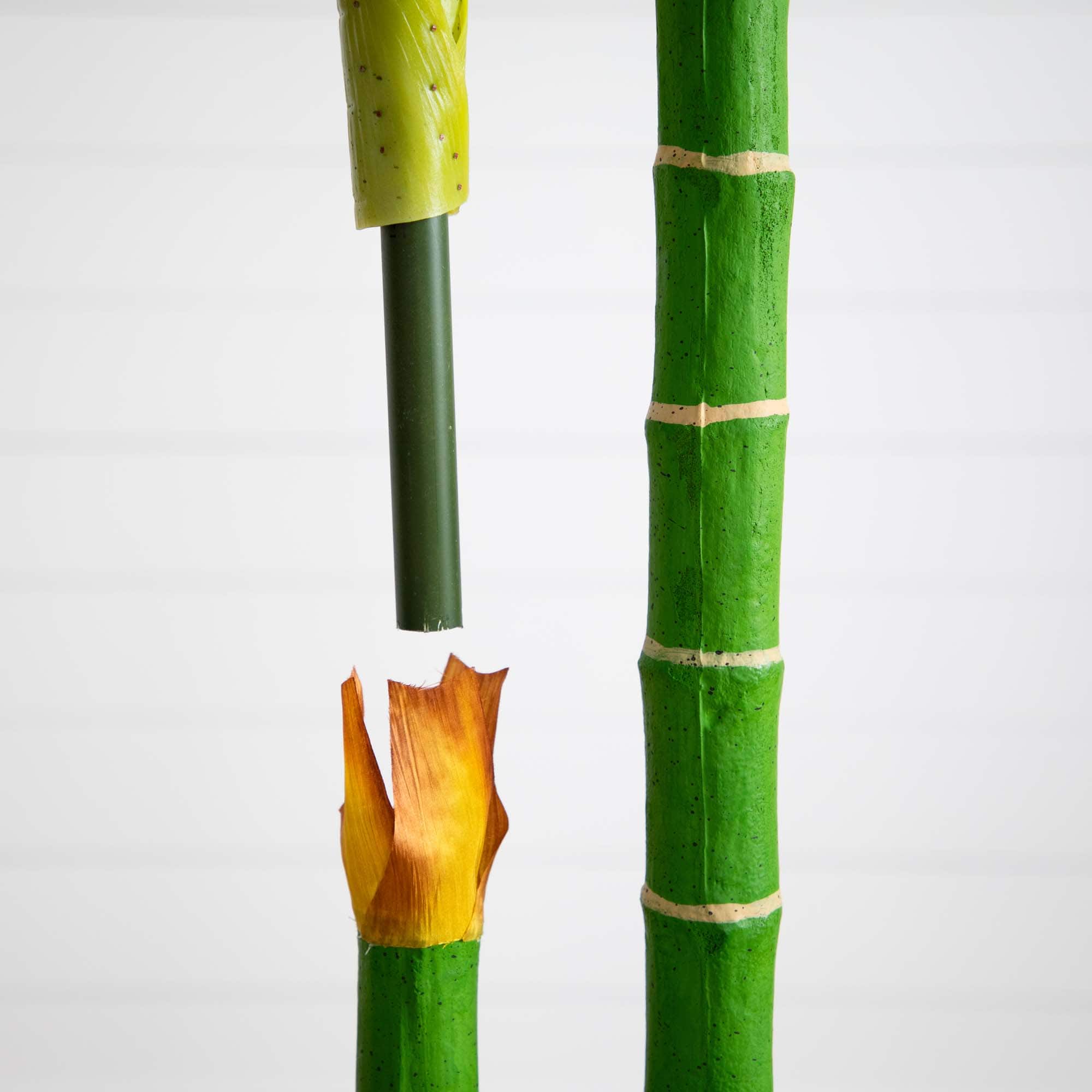 9ft. Potted Green Artificial Double Golden Cane Palm Tree