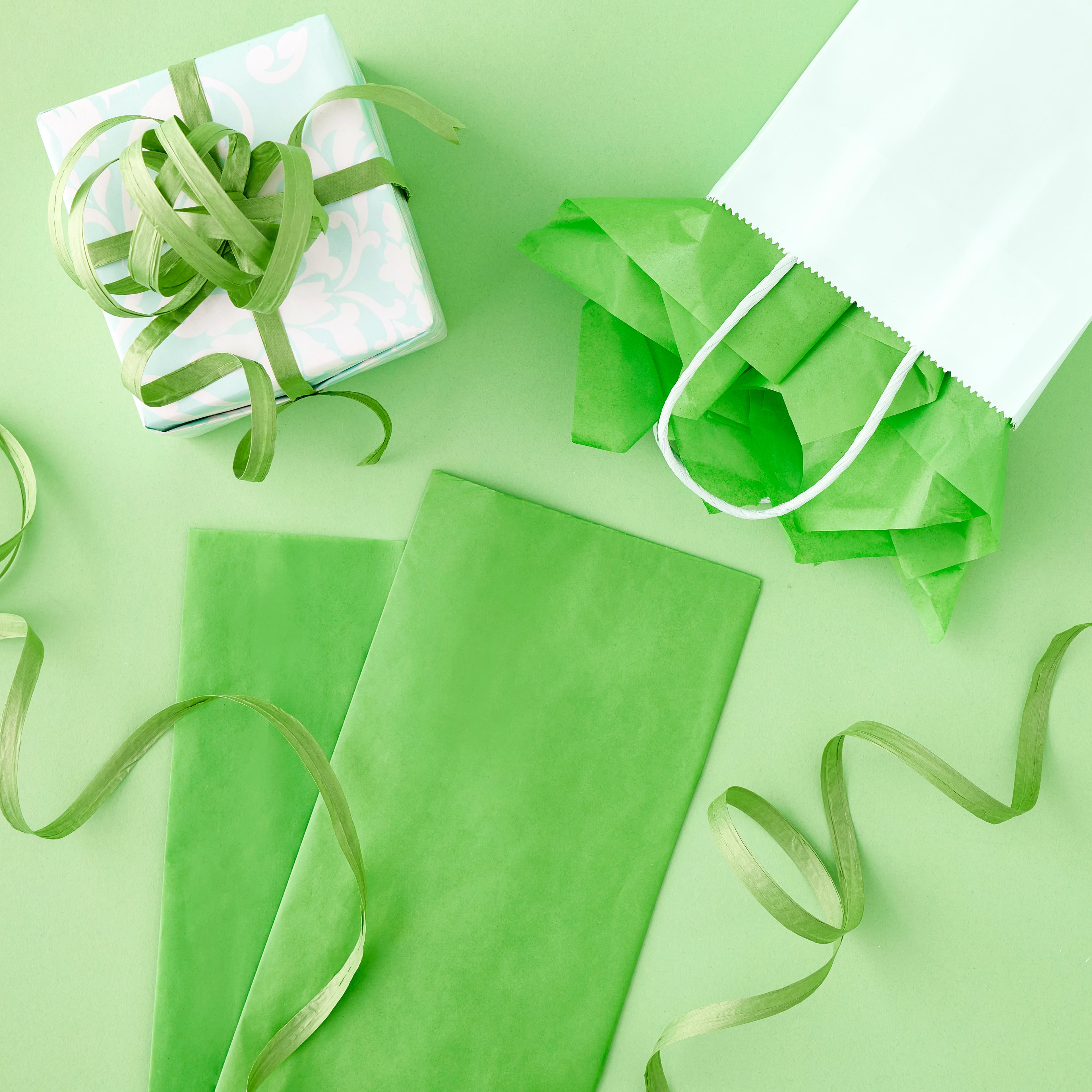 Festive Green Tissue Paper by Celebrate It™, 12 Sheets