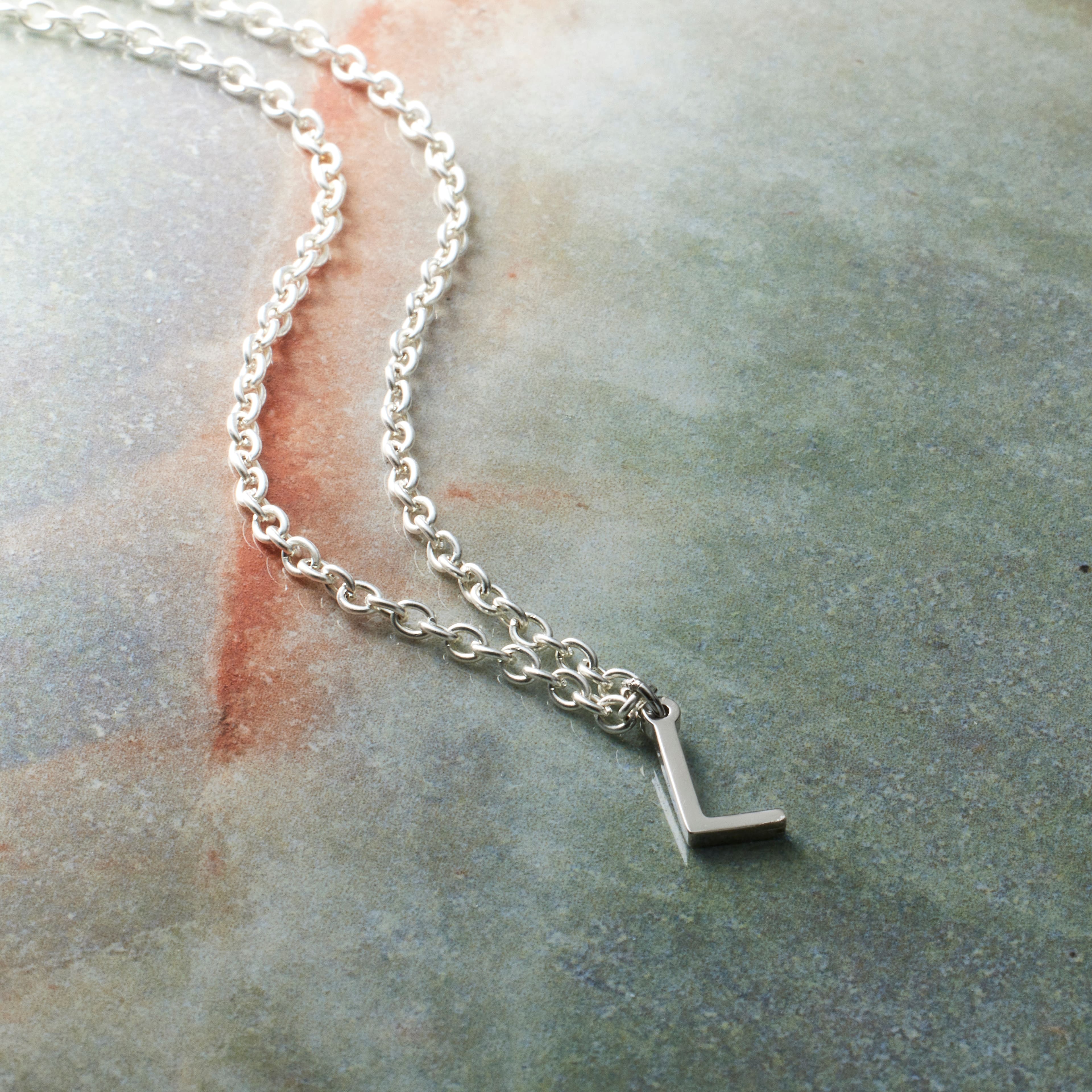 12 Pack: Sterling Silver Alphabet Charm by Bead Landing™
