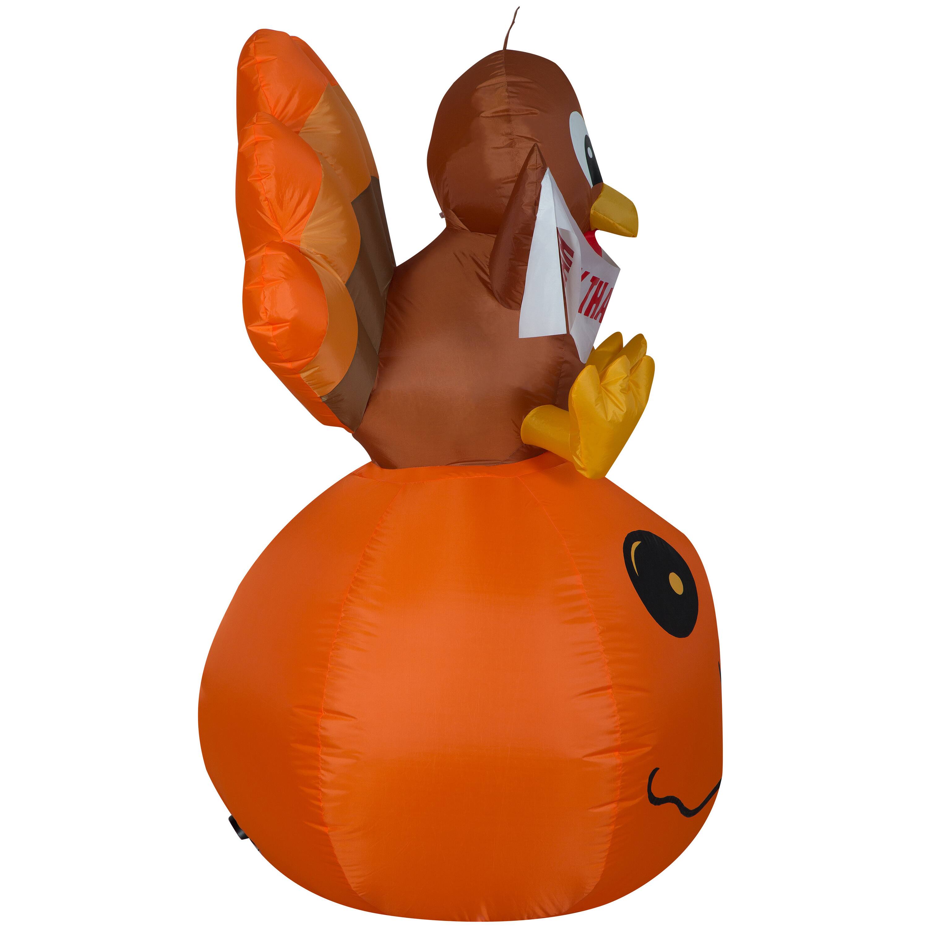 5ft. Airblown® Inflatable Harvest Turkey & Pumpkin with Banner Scene