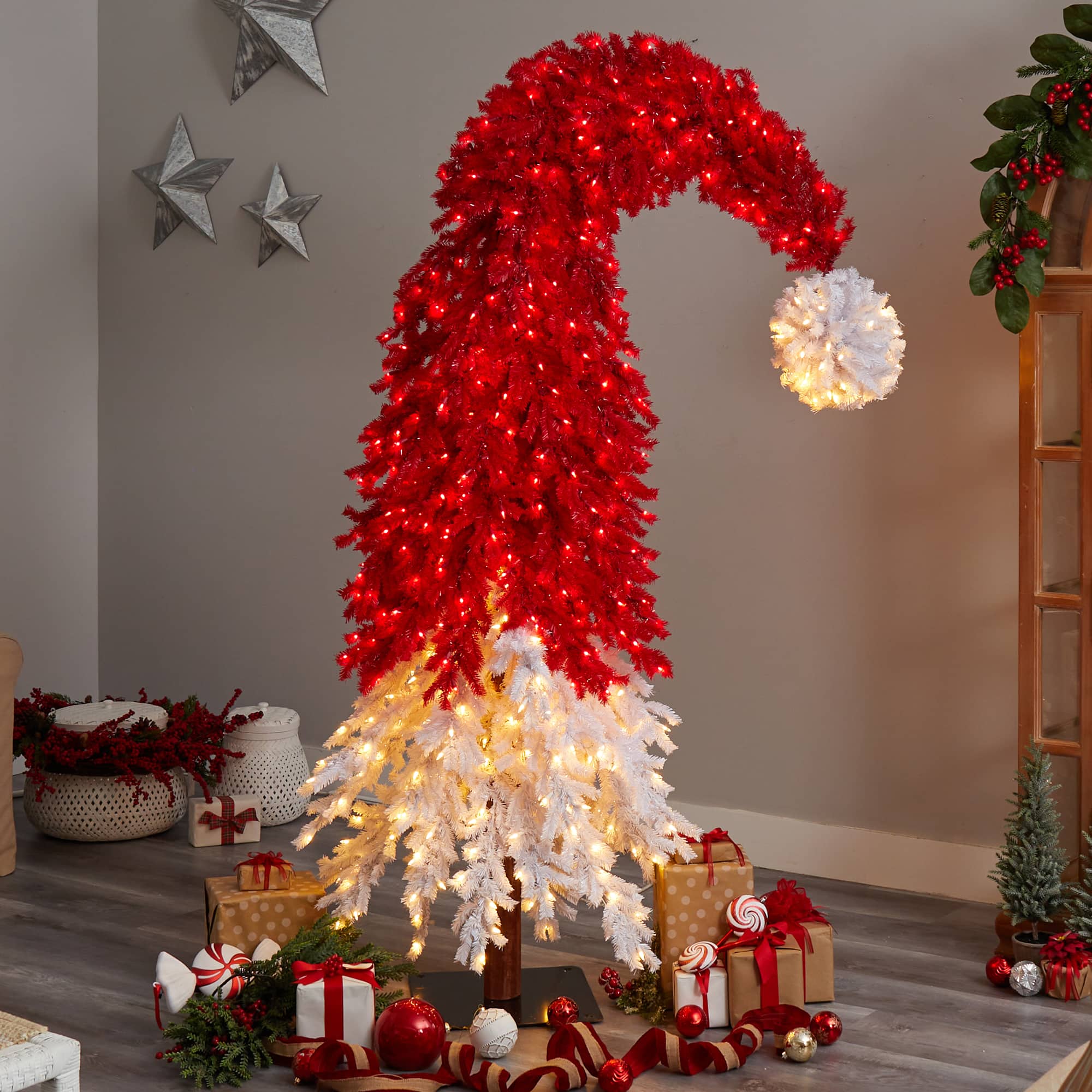 9ft. Pre-Lit Holiday Red Santa Hat Artificial Christmas Tree, White LED Lights