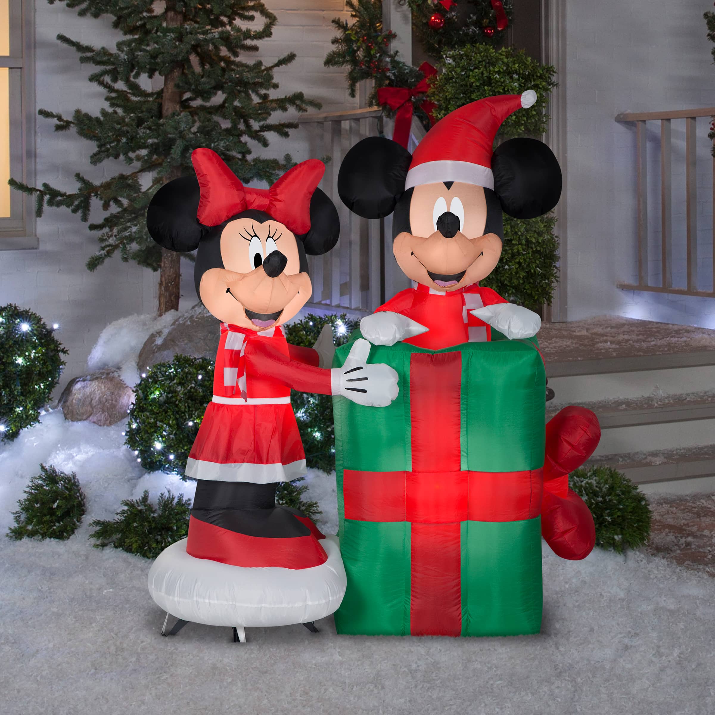 5ft. Animated Airblown® Inflatable Minnie with Mickey Popping Out of Present Scene