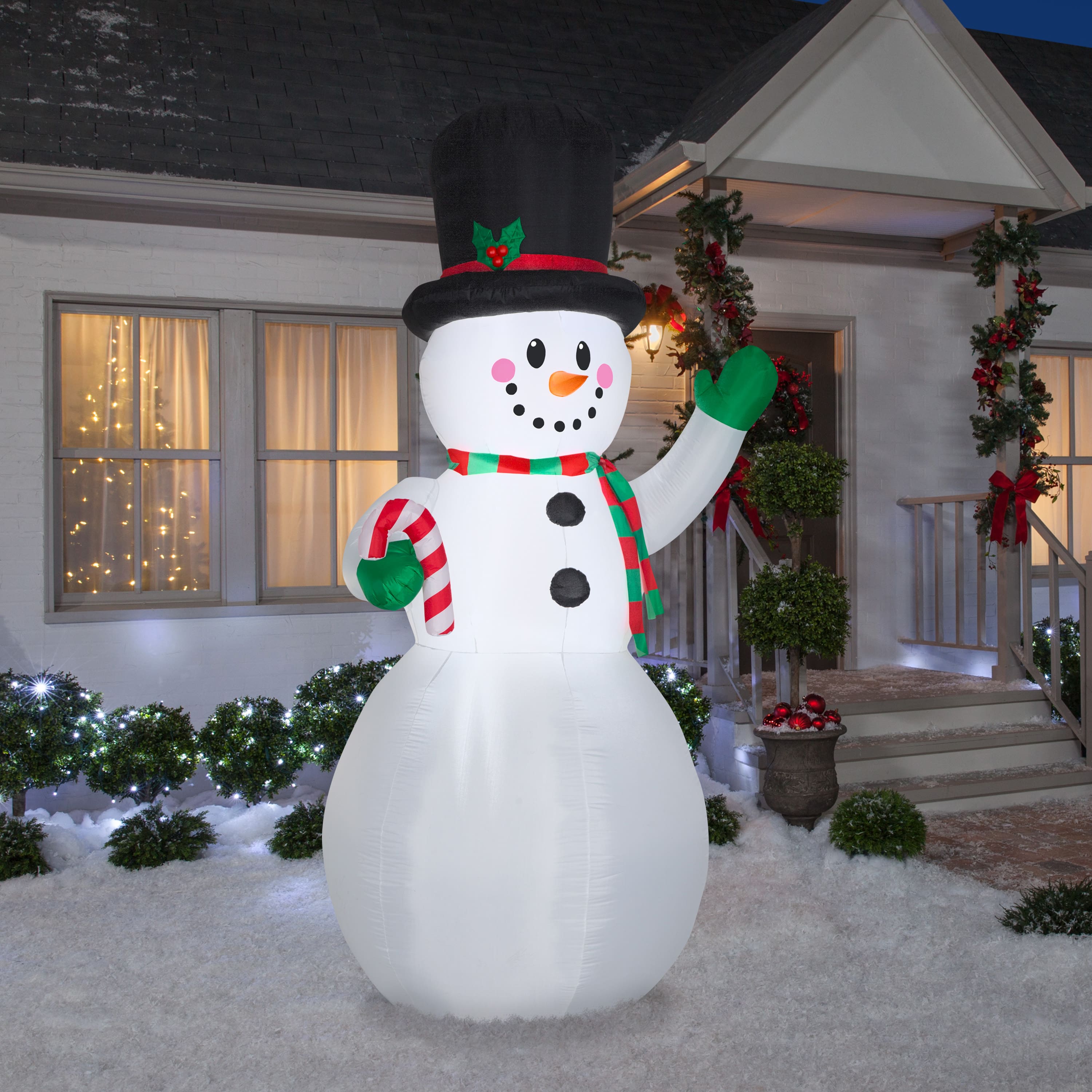 9ft. Airblown® Inflatable Snowman with Candy Cane