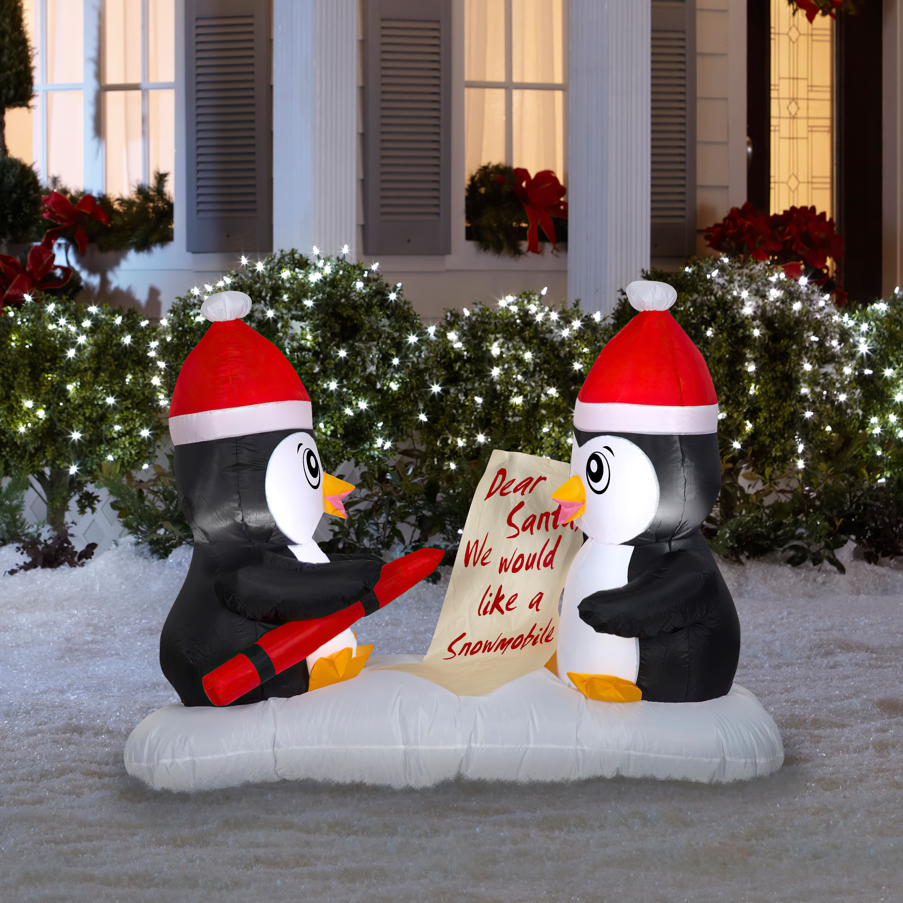 3ft. Airblown® Inflatable Penguin Letters Scene