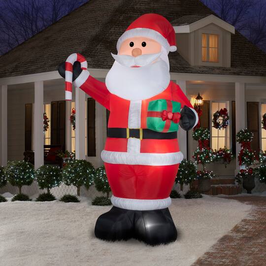 12ft. Airblown® Inflatable Santa with Gift & Candy Cane | Michaels