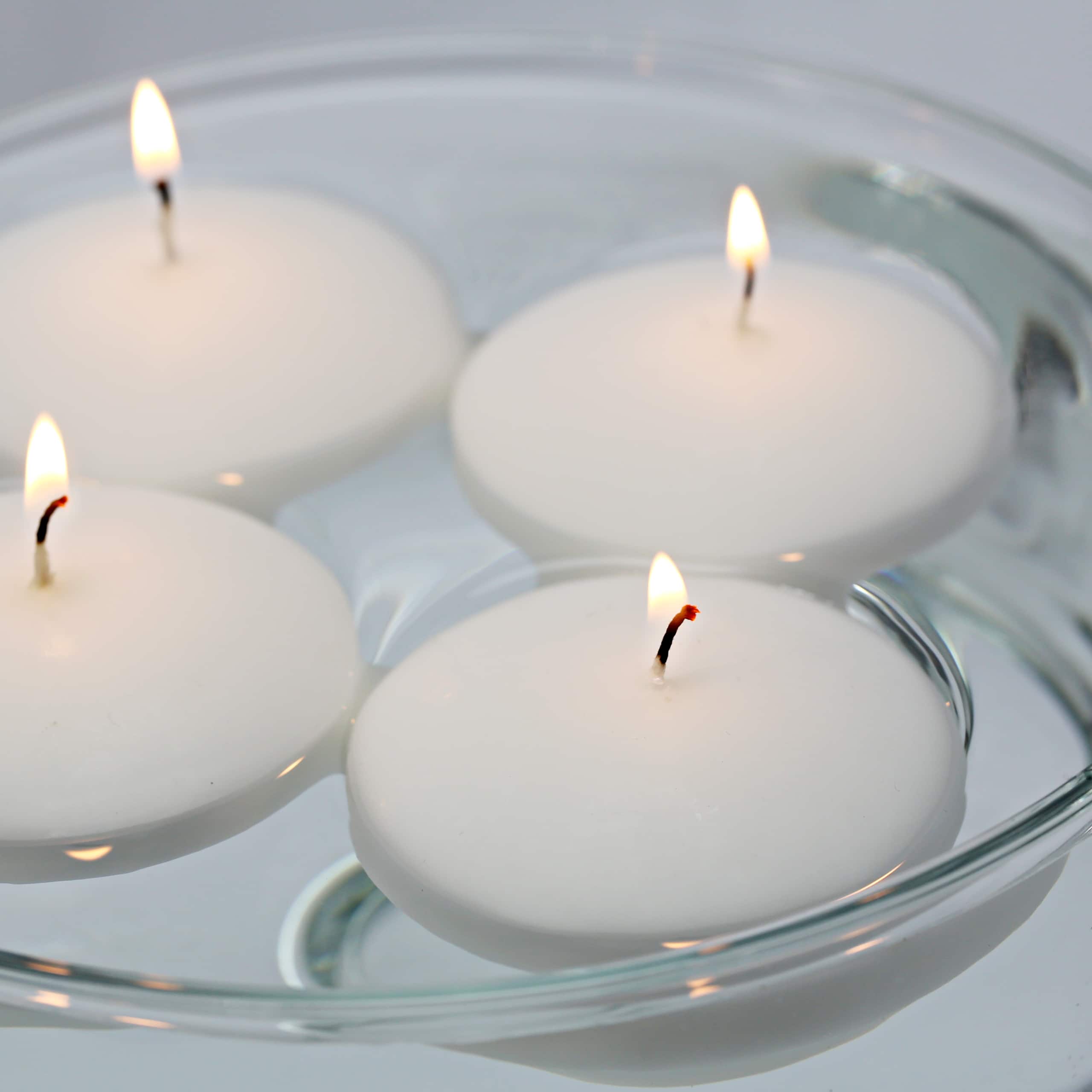 Basic Elements™ White Floating Candles, 4ct. by Ashland®
