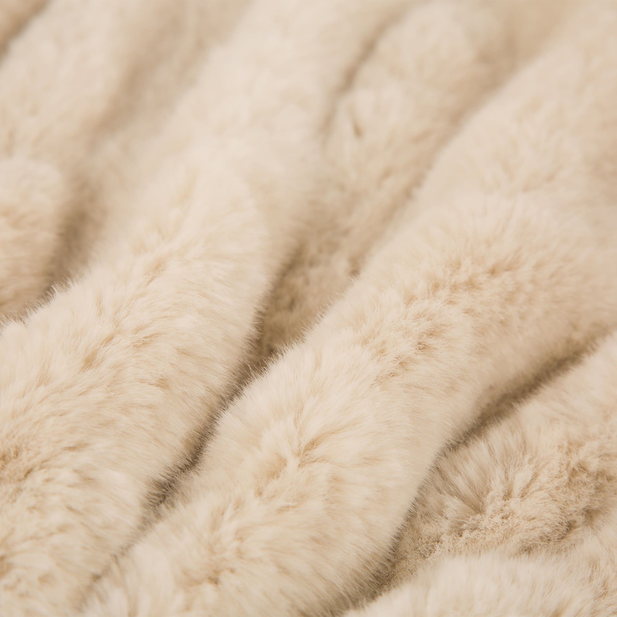 Buy the Glitzhome® Beige Faux Fur Throw Blanket at Michaels