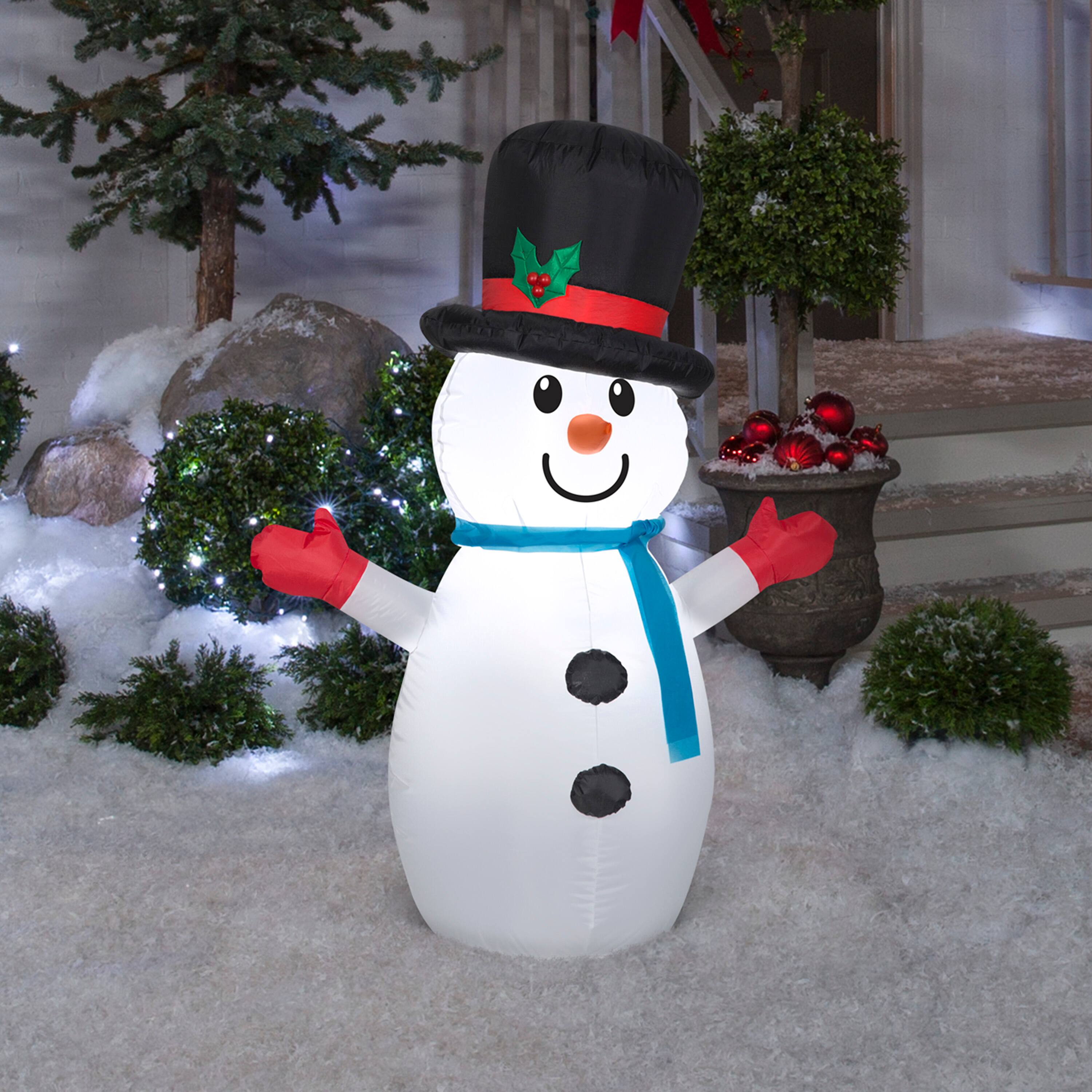 4ft. Airblown&#xAE; Inflatable Christmas Little Snowman in Top Hat