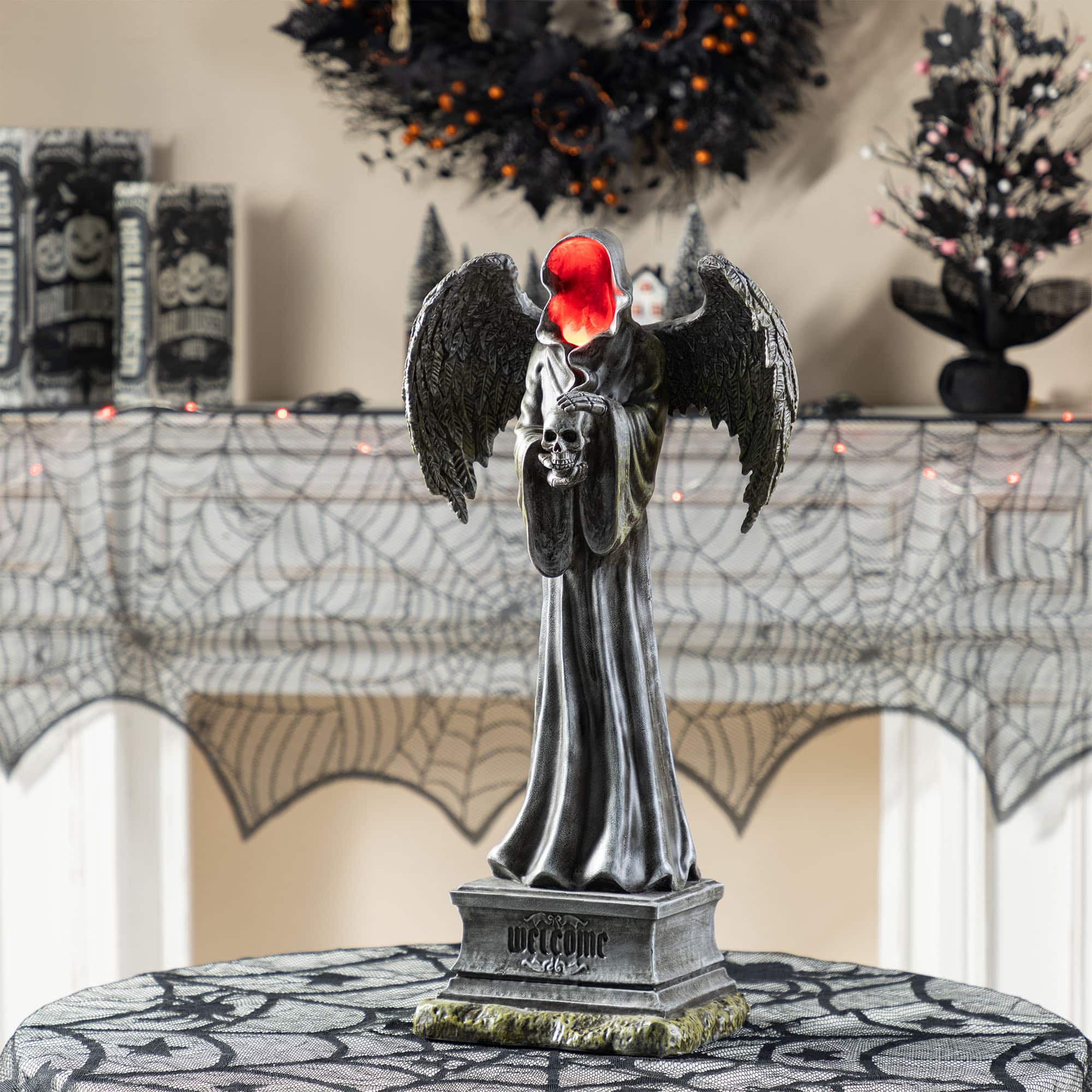 Glitzhome&#xAE; 24&#x22;H Lighted Halloween Grim Reaper Resin Porch Decor
