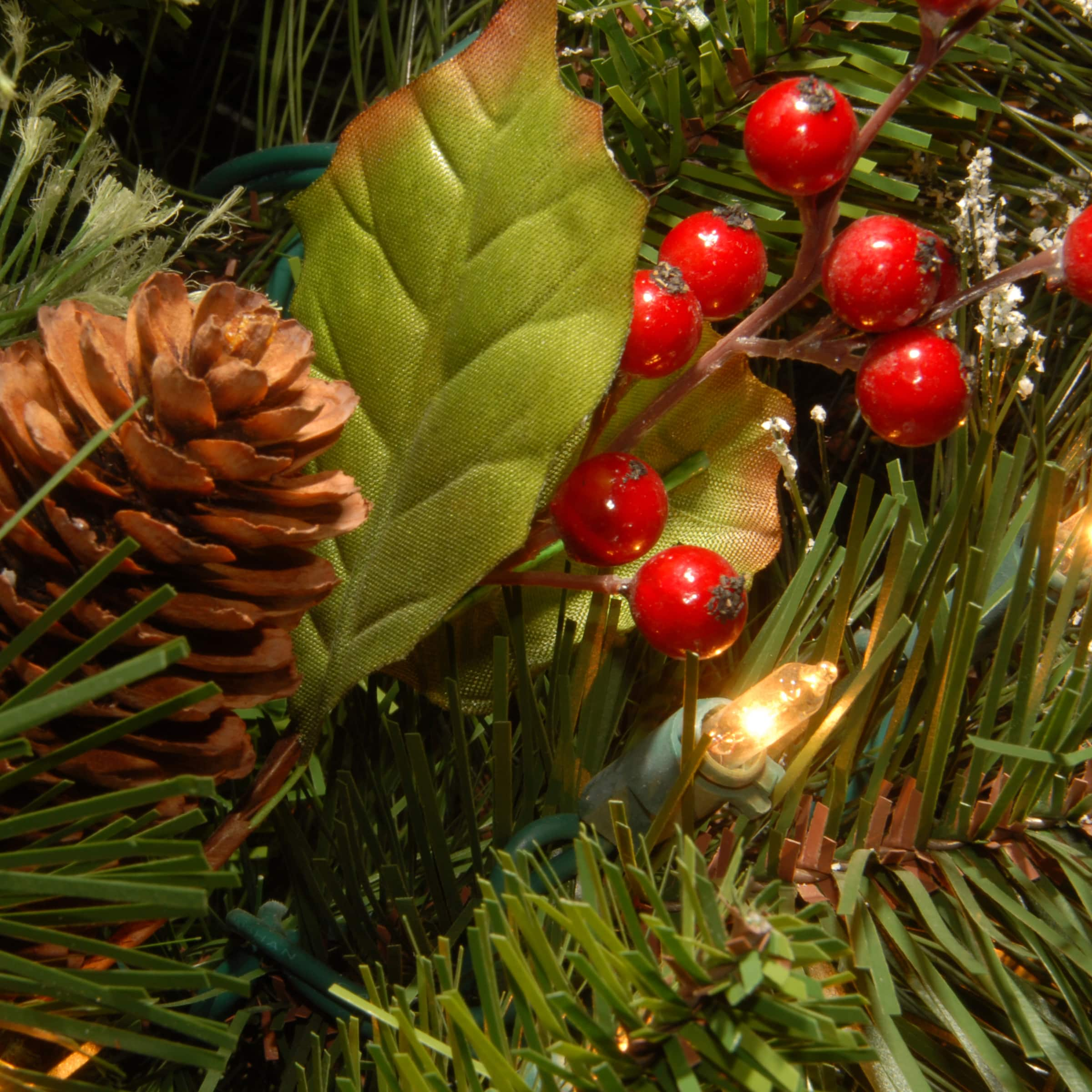 9ft. Pre-Lit Wintry Pine&#xAE; with Cones, Berries, Snowflakes and Clear Lights Garland