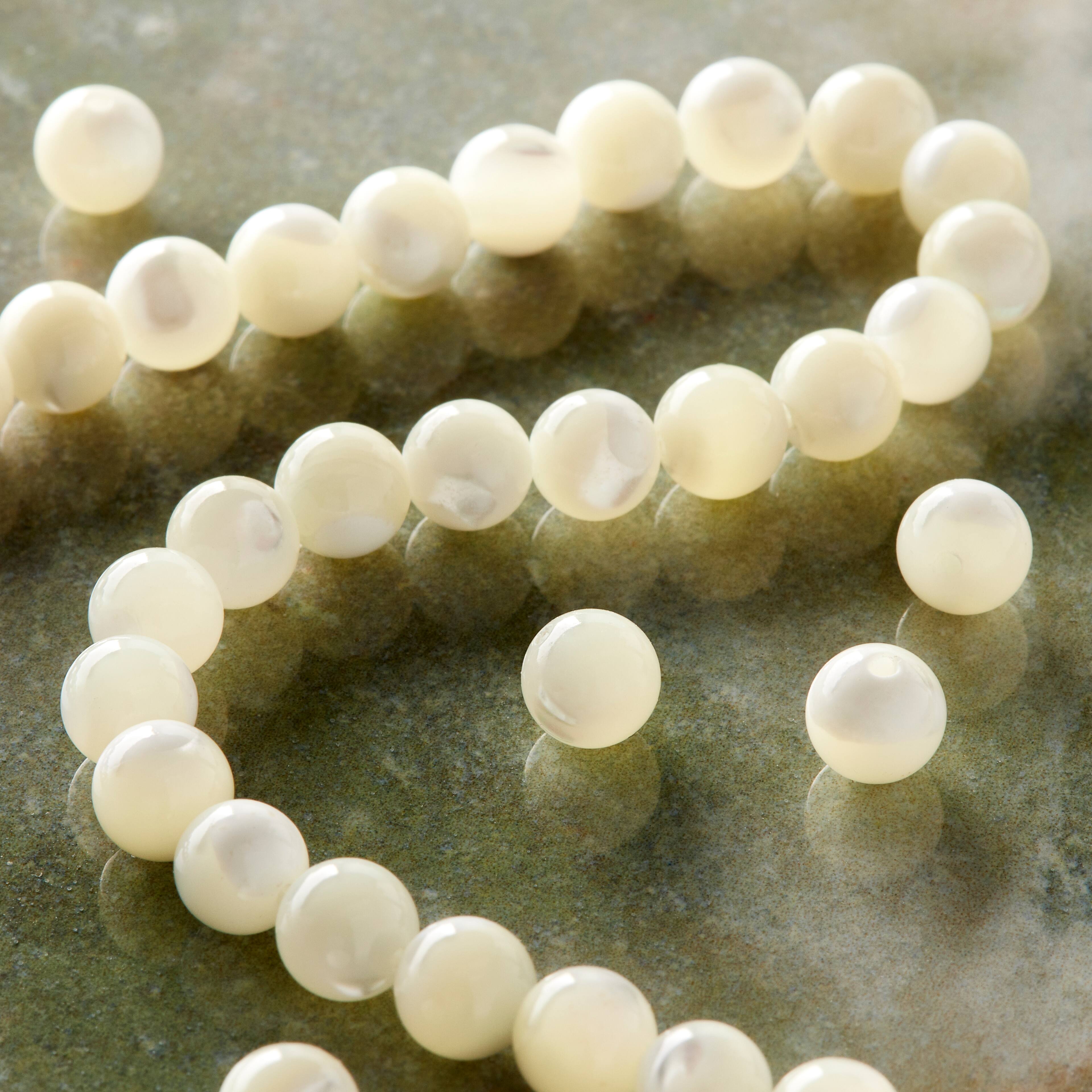 12 Pack: White Mother of Pearl Round Beads by Bead Landing™, 6mm
