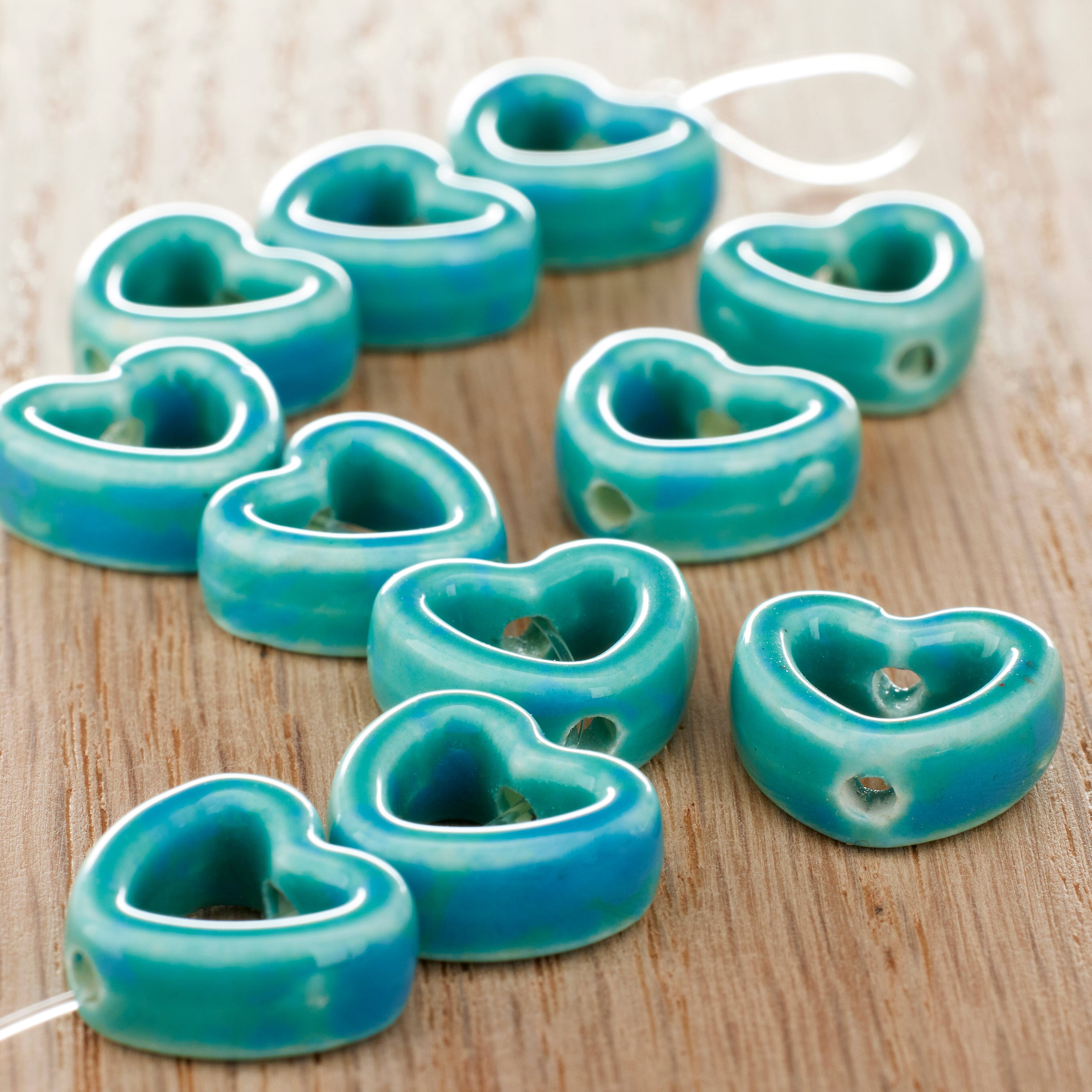 12 Packs: 11 ct. (132 total) Turquoise Ceramic Heart Beads, 14mm by Bead Landing&#x2122;