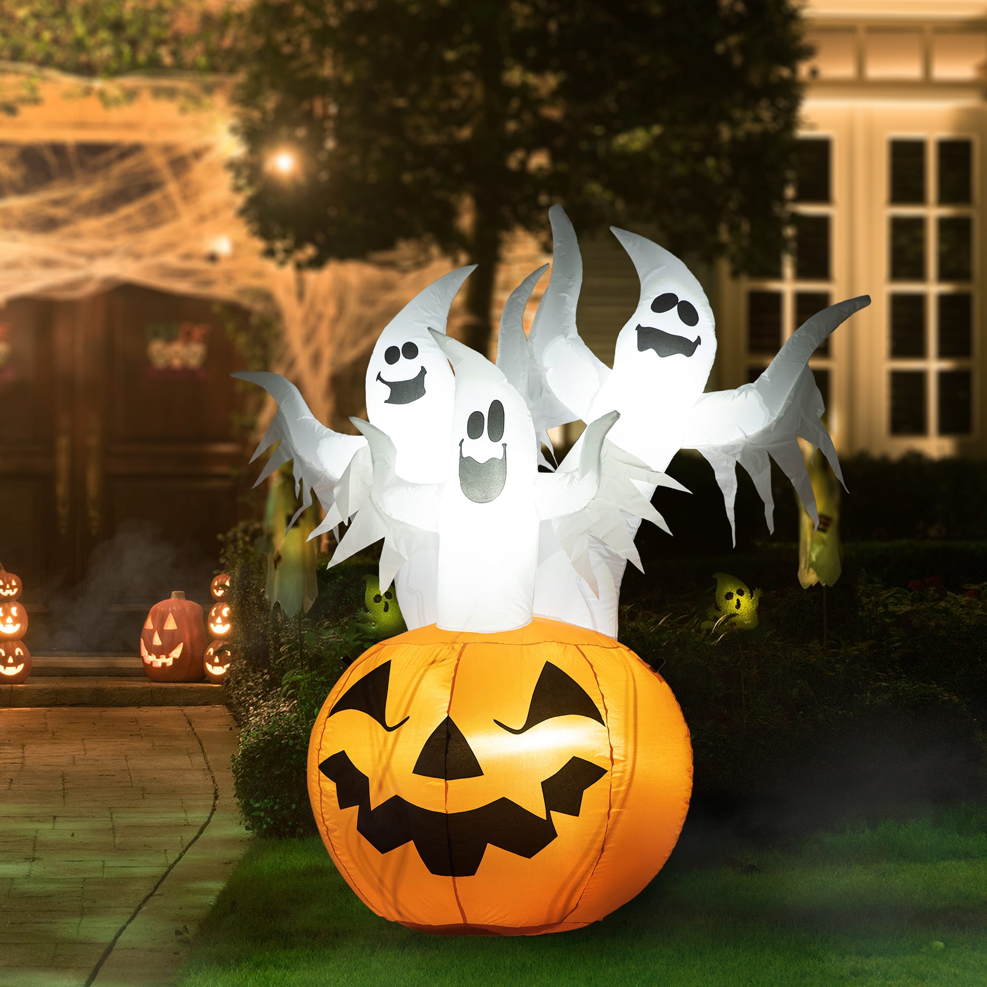 Glitzhome&#xAE; 6ft. Lighted 3 Ghosts In Jack-O&#x27;-Lantern Pumpkin with Scream Inflatable D&#xE9;cor