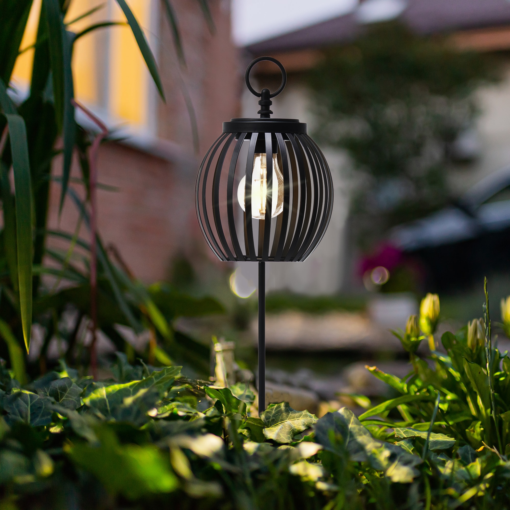 Glitzhome&#xAE; 32.25&#x22; Black Metal Stripes Solar Powered Outdoor Lantern