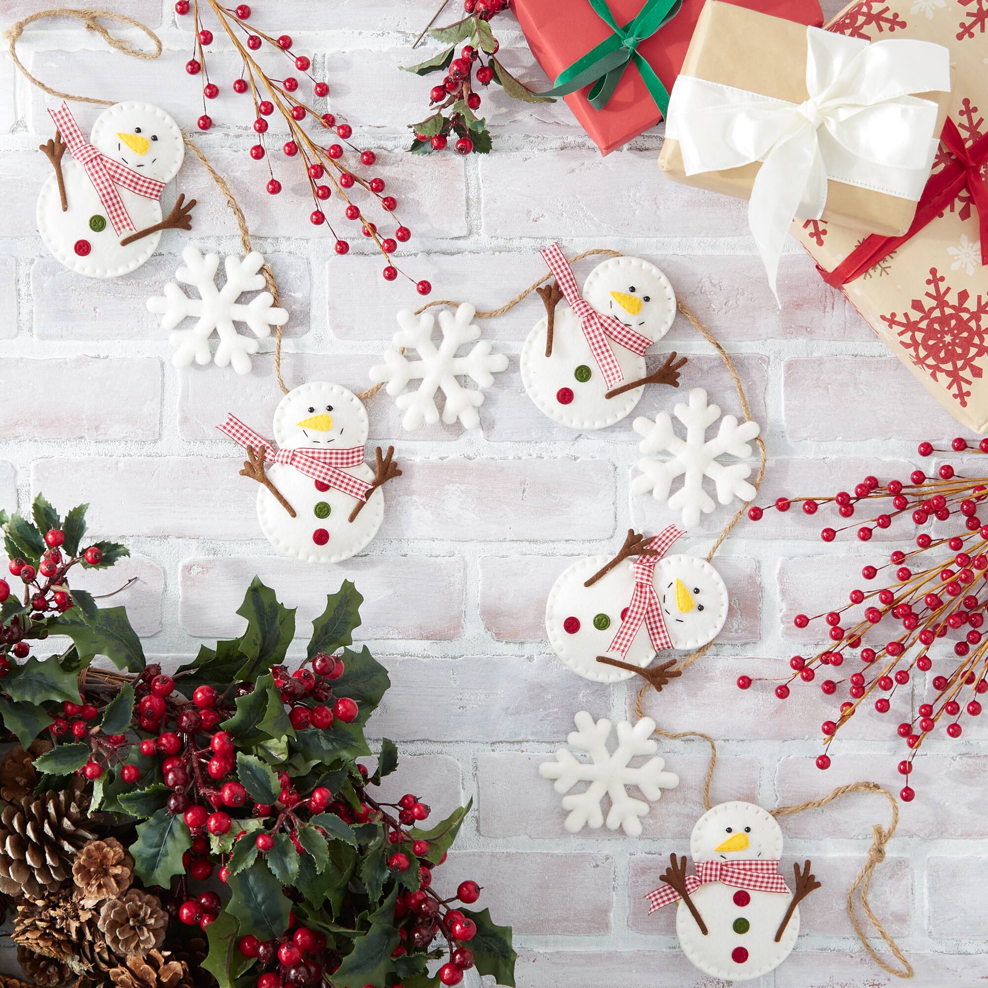 DII&#xAE; 4.9ft. Snowman &#x26; Snowflake Garland