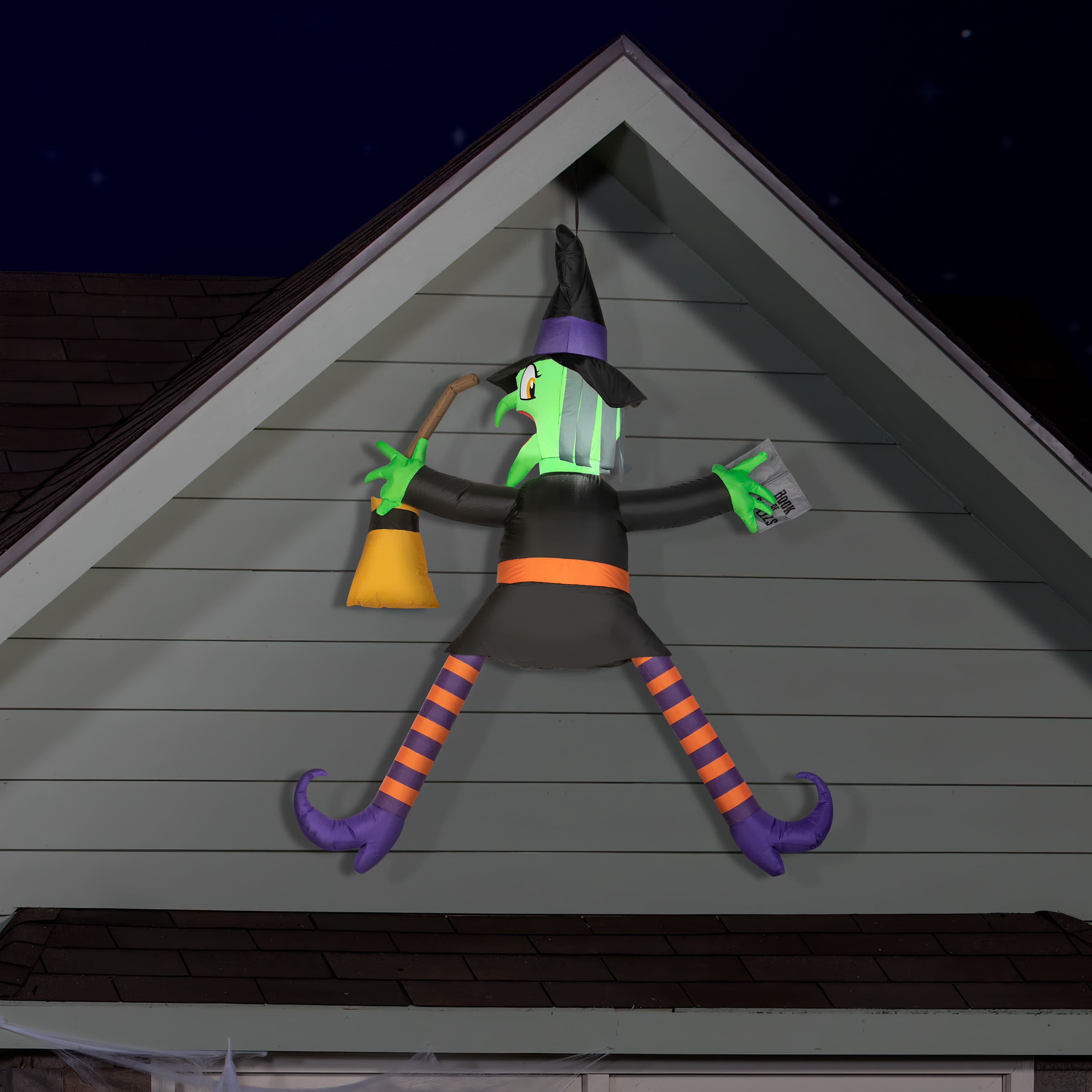 5ft. Airblown&#xAE; Inflatable Halloween Crashing Witch with Spell Book