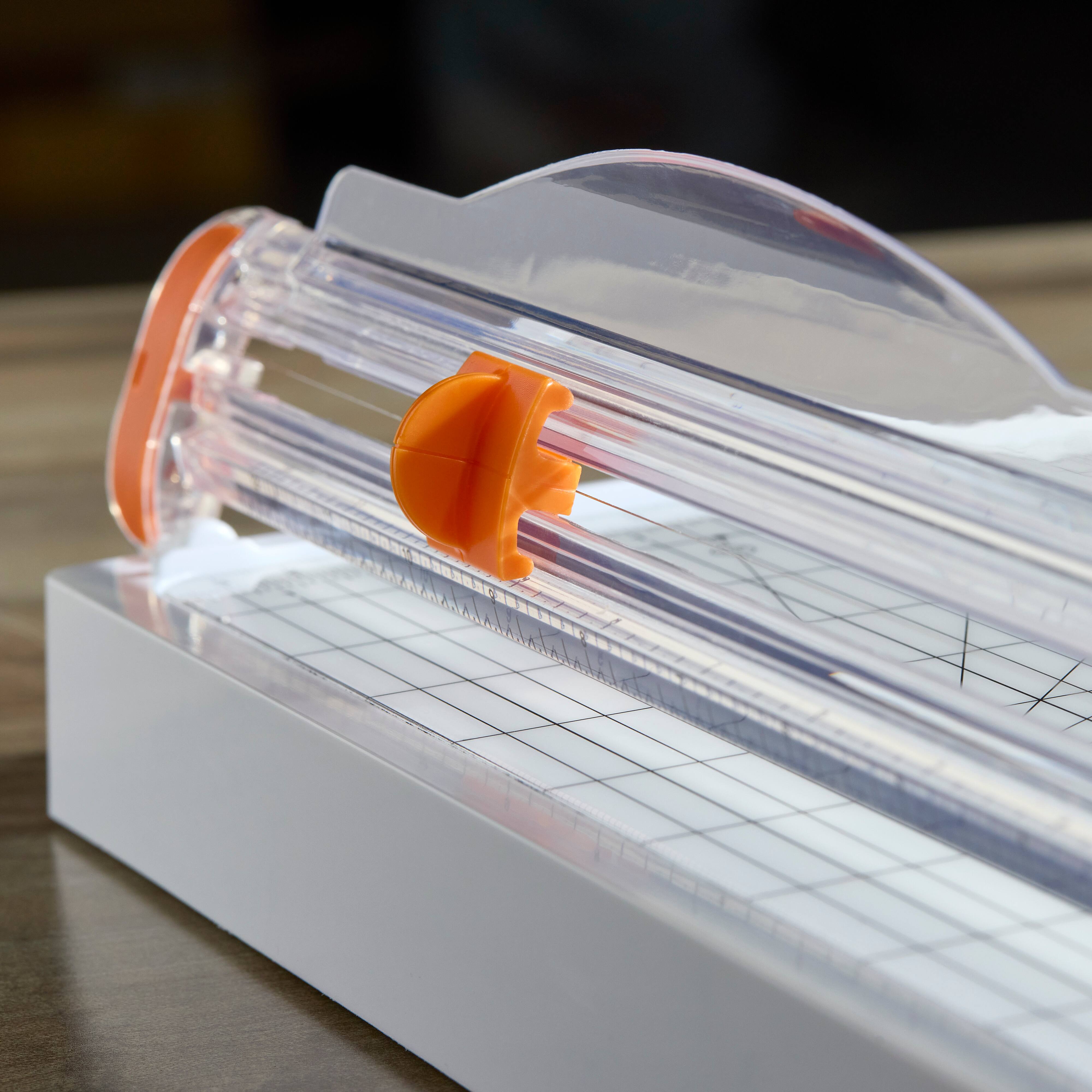 Fiskars® SureCut™ Deluxe Trimmer with Built-In Storage