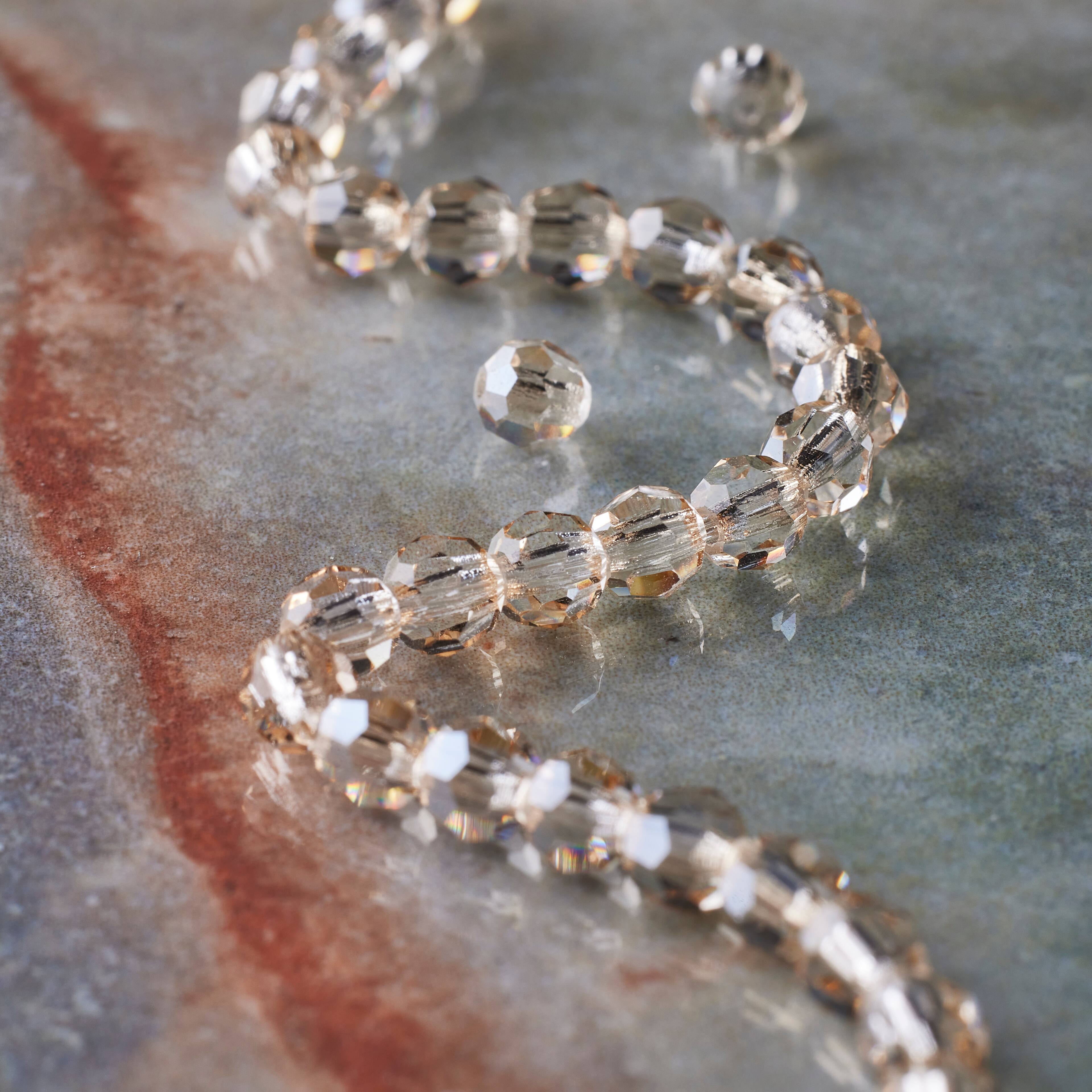 12 Packs: 31 ct. (372 total) Preciosa Glass Crystal Round Beads, 4mm by Bead Landing™