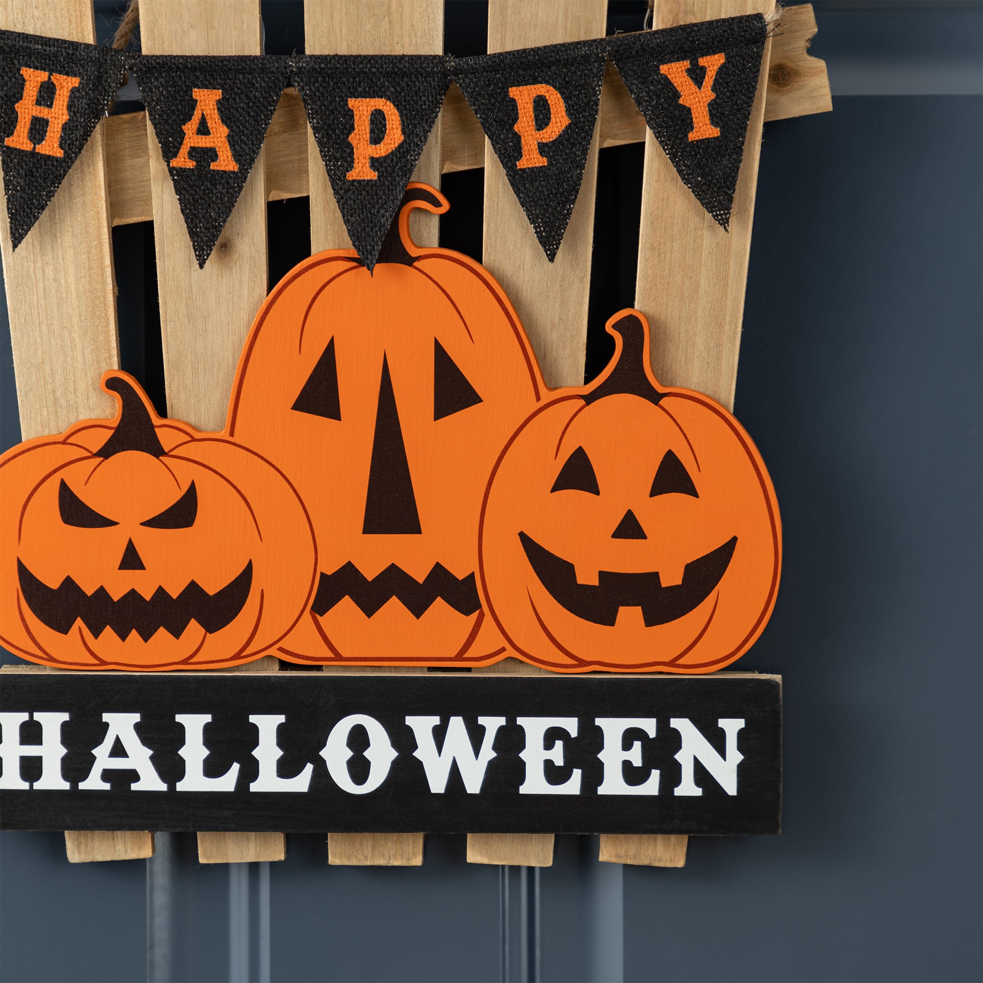 Glitzhome&#xAE; 14&#x22;H Halloween Wood Jack O Lantern Door Hanger