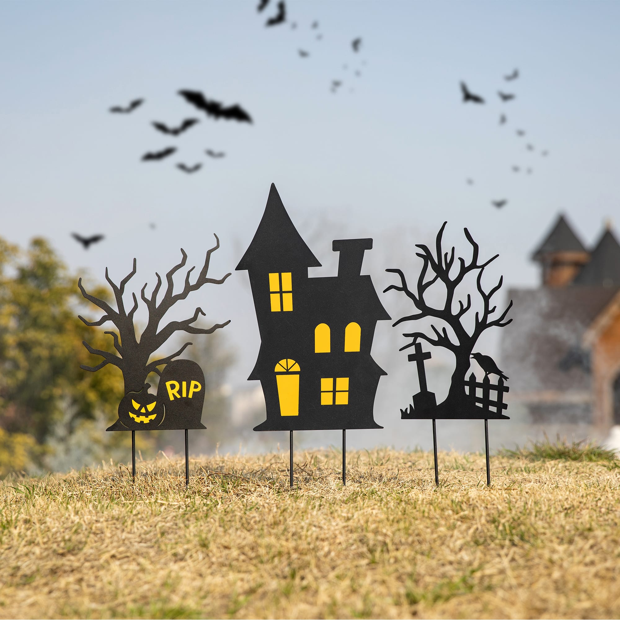 Glitzhome® 2ft. Halloween Metal Silhouette Haunted House and Ghost Tree Yard Stake Set