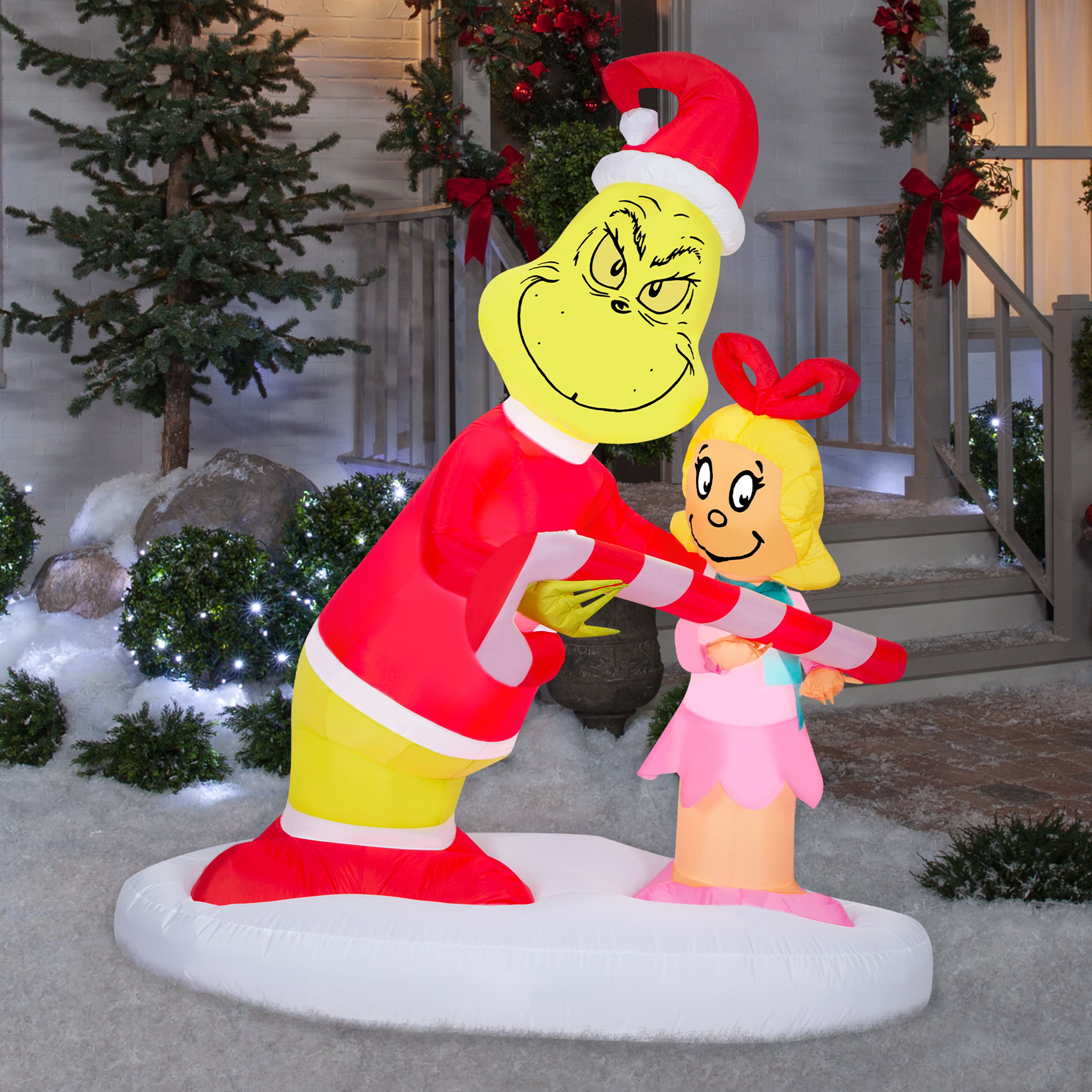 5.5ft. Airblown&#xAE; Inflatable Christmas Grinch Passing Out Candy Canes to Cindy Lou