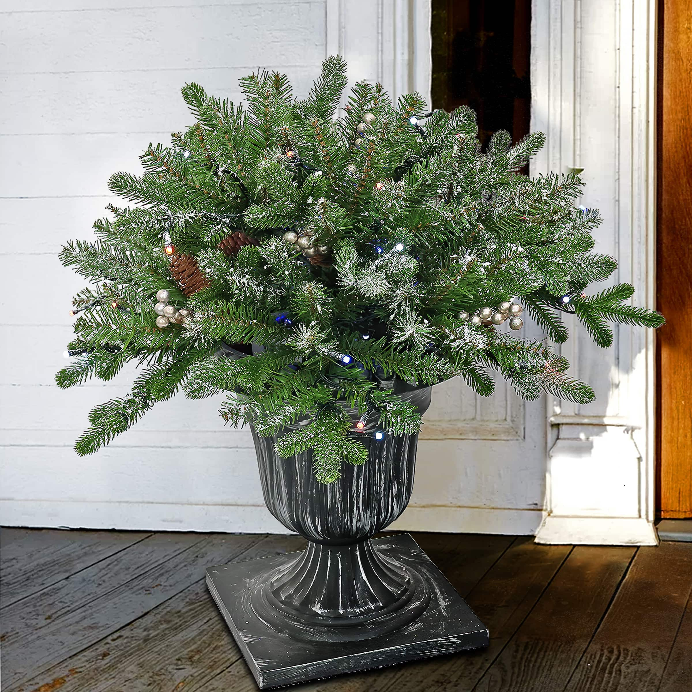 24&#x22; Feel Real&#xAE; Snowy Morgan Spruce Porch Bush in Silver Brushed Plastic Urn with Cones &#x26; Champagne Berries