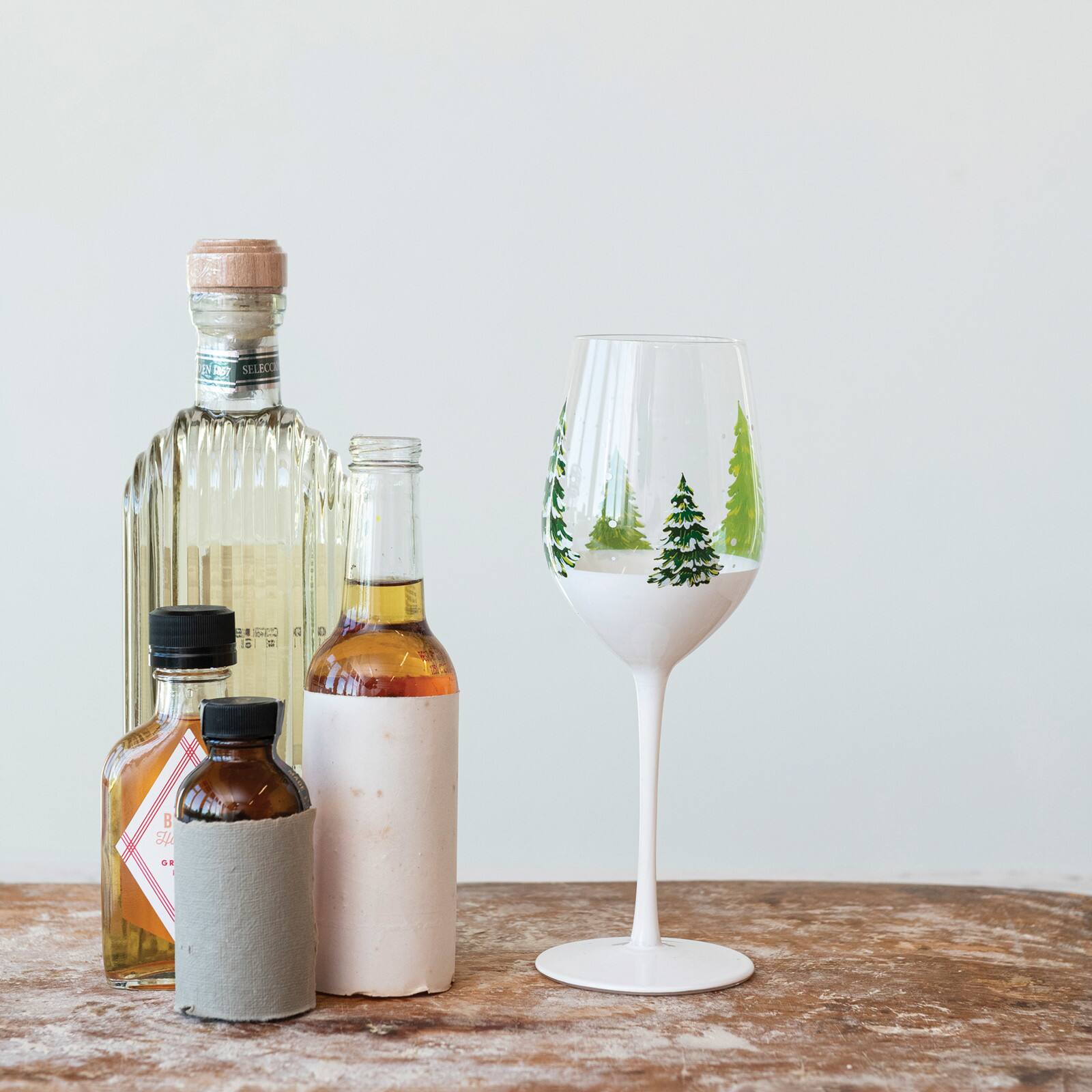 Hello Honey® 12oz. Clear & Green Tree & Snow Wine Glass Set