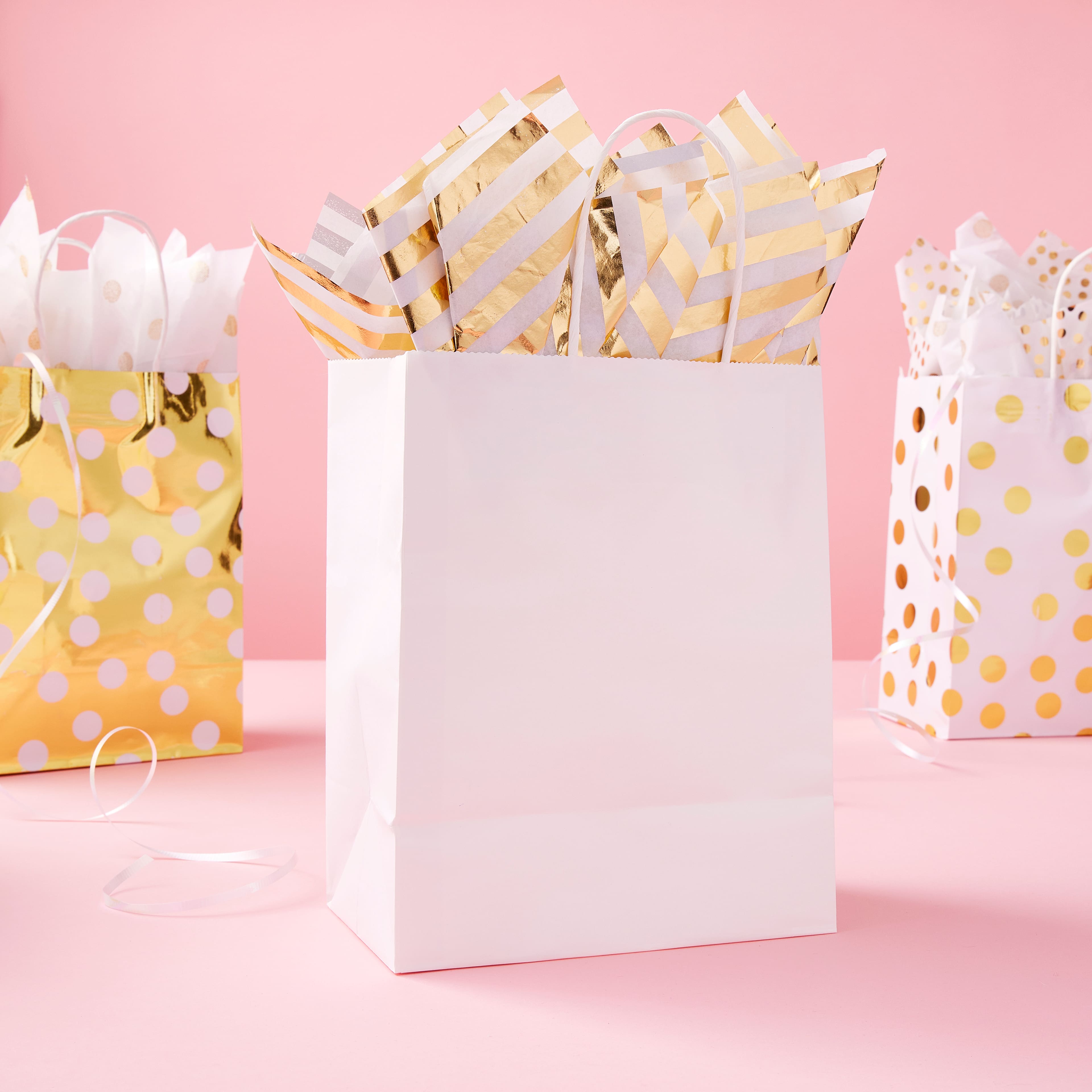 6 Packs: 30 ct. (180 total) Medium White Paper Gift Bags by Celebrate It&#x2122;