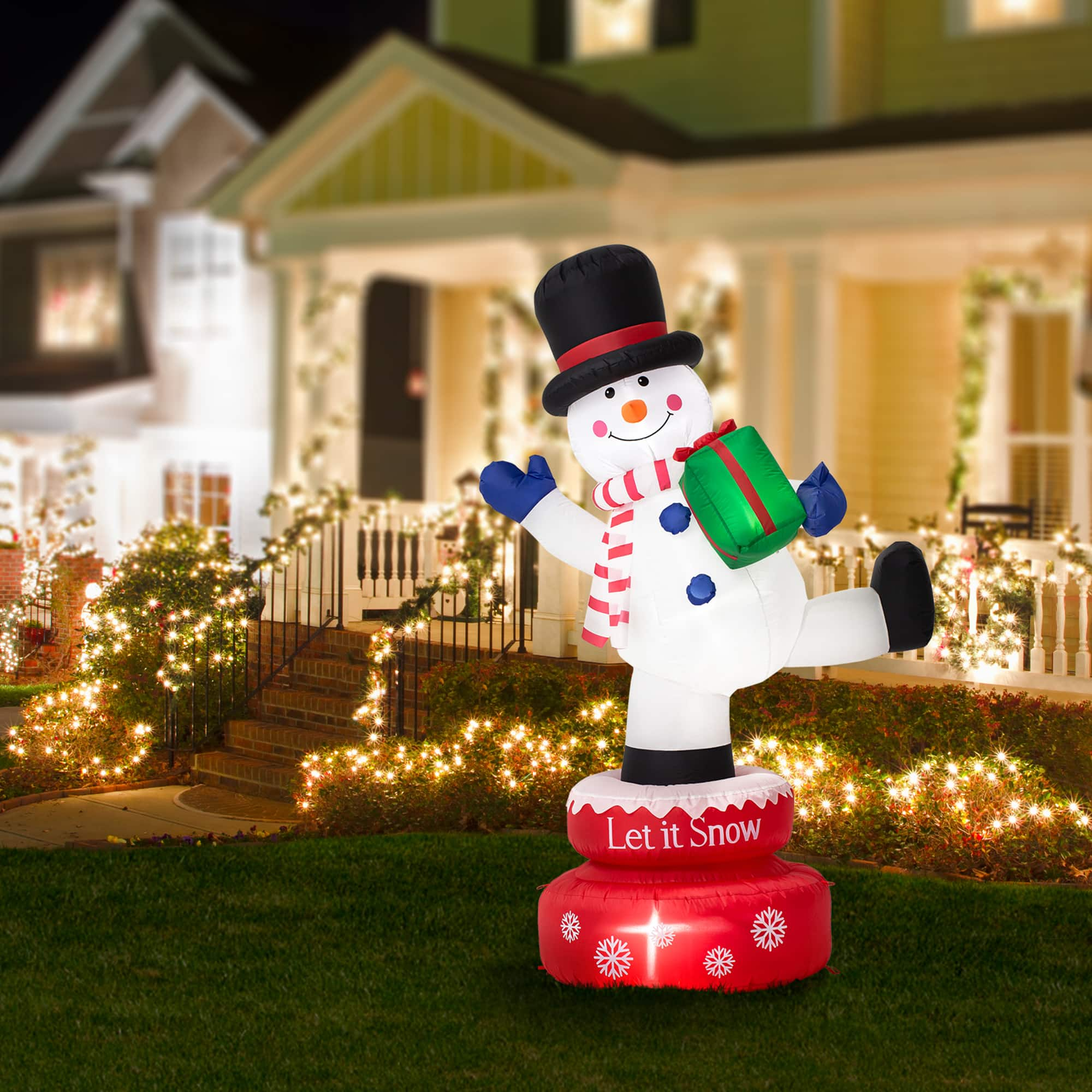 Glitzhome&#xAE; 6ft. Lighted Inflatable Rotating Snowman D&#xE9;cor