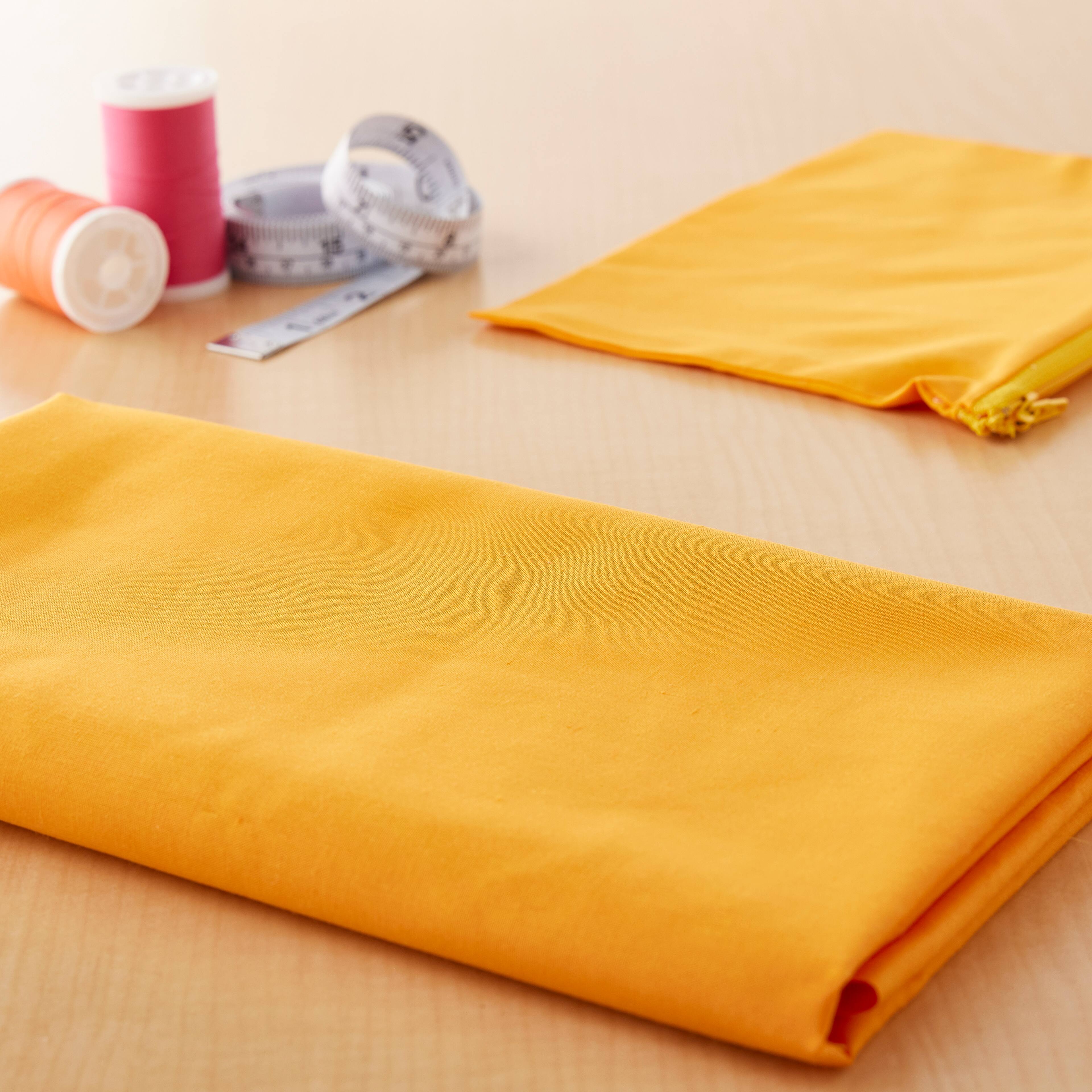 Feldman Solid Light Orange Quilting Broadcloth Fabric