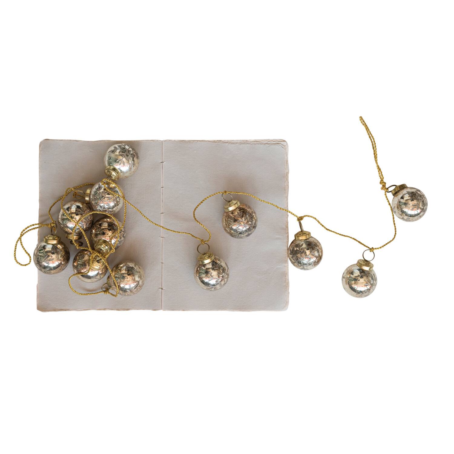Hello Honey® 6ft. Antique Gold Etched Mercury Glass Ball Ornament Garland with Snowflakes