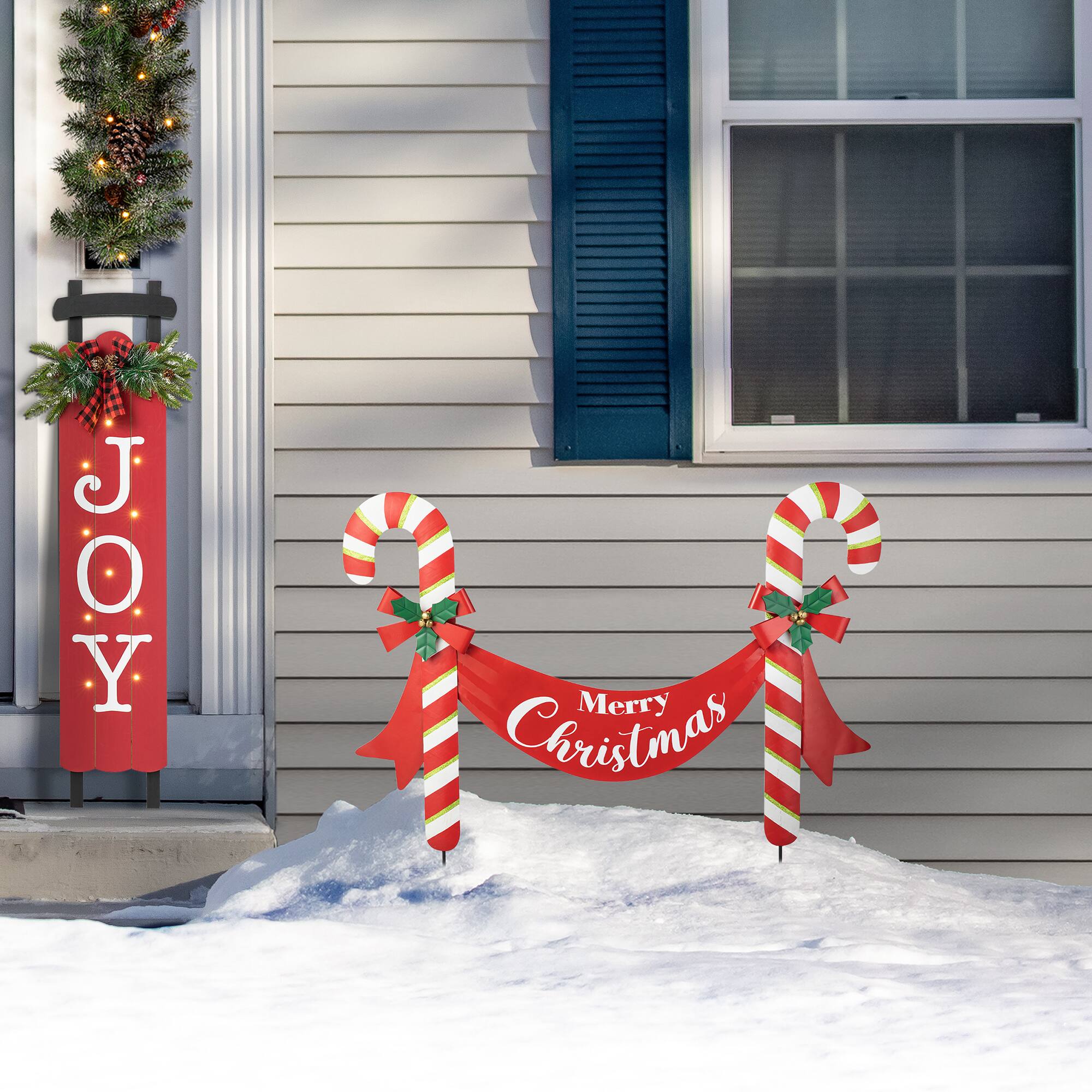 Glitzhome&#xAE; 3ft. Merry Christmas Candy Cane Metal Yard Stake