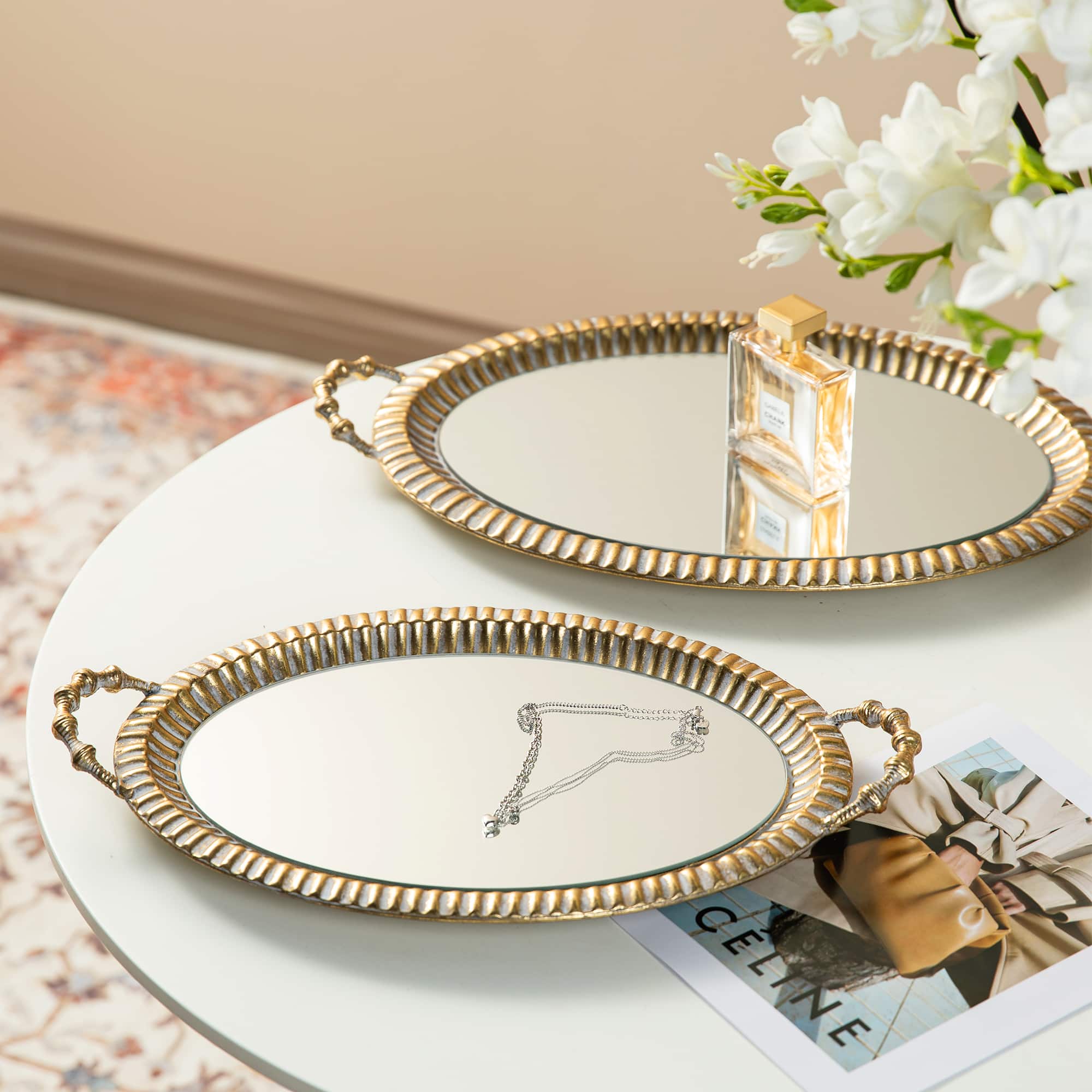 Glitzhome&#xAE; Gold Oval Metal Mirrored Decorative Trays Set