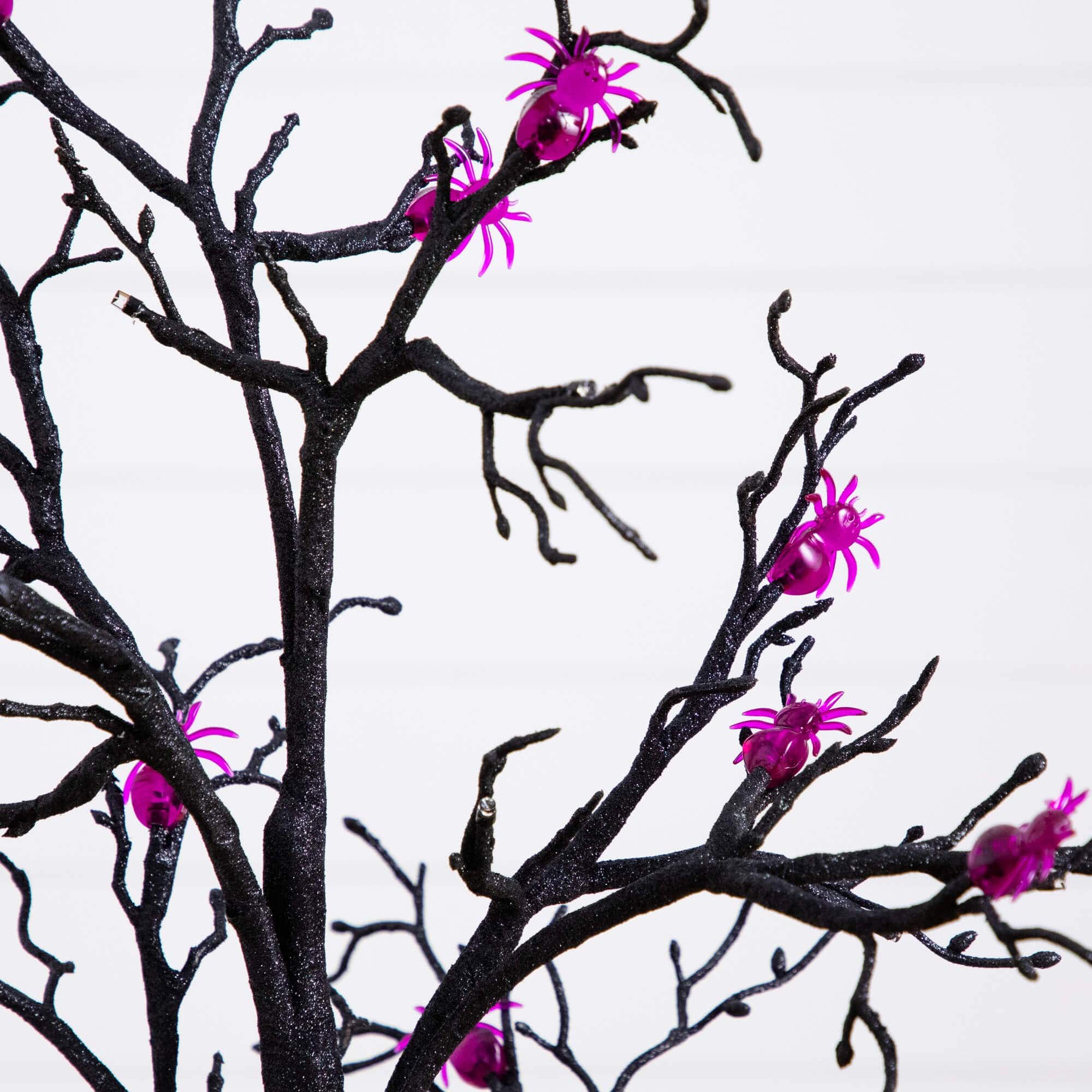 3ft. Pre-Lit Artificial Halloween Spider Twig Tree with 36 Purple LED Lights