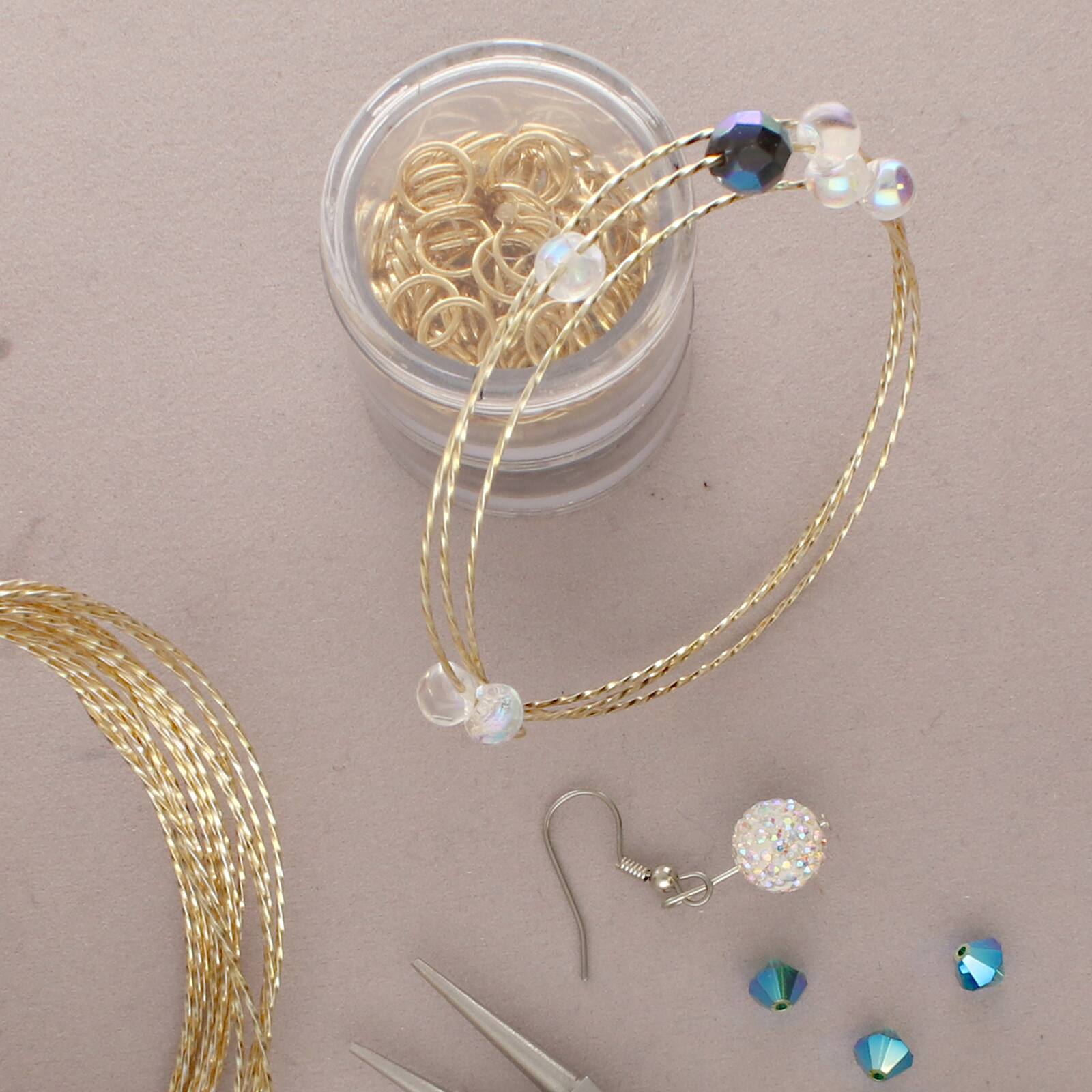 The Beadsmith® Wire Elements™ 18 Gauge Gold Tarnish Resistant Soft Temper Wire, 8ft.