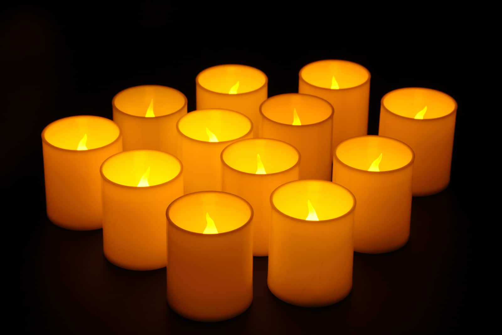 Michaels White Glitter LED Votive Candles by Ashland 12ct.