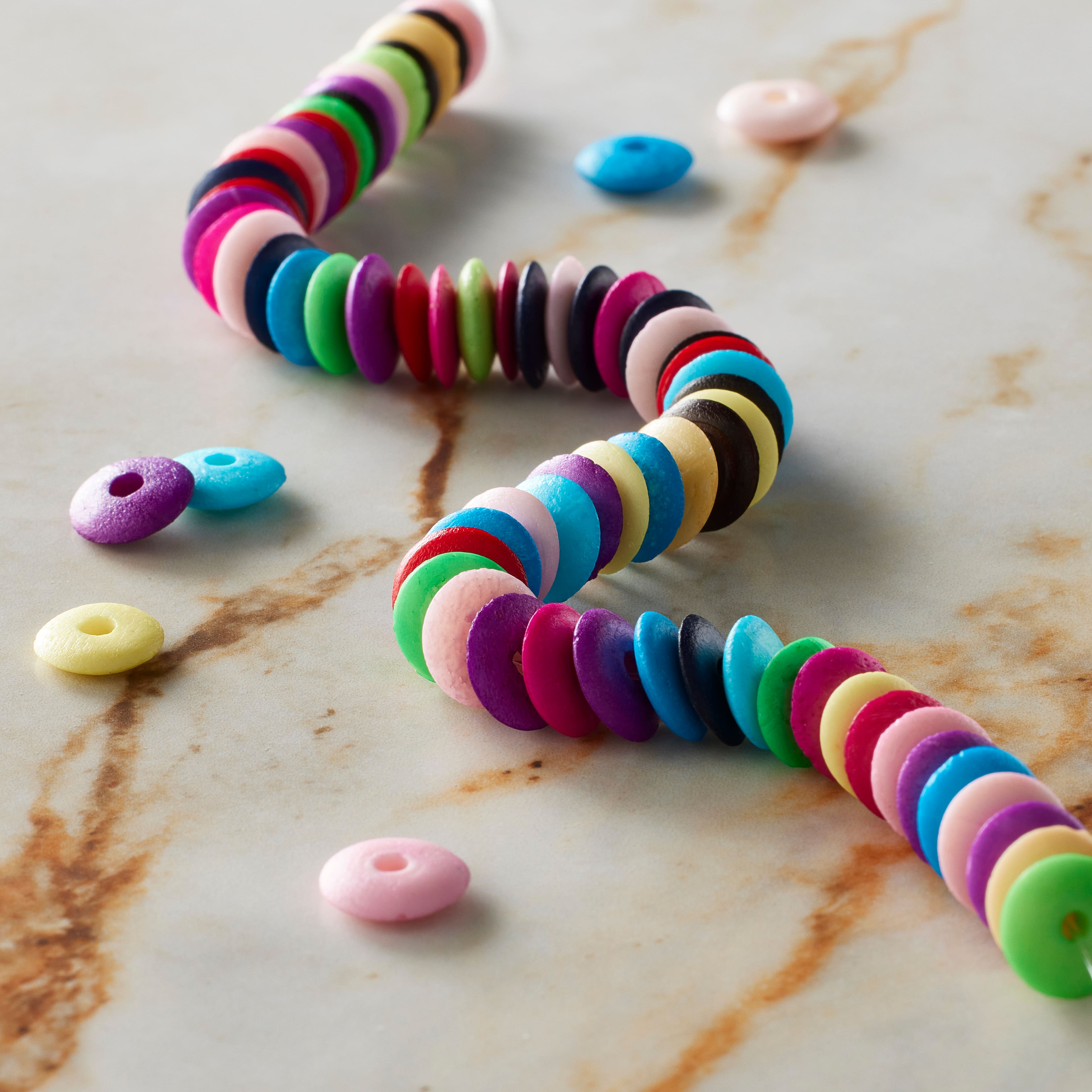 Multicolor Bone Rondelle Beads by Bead Landing®